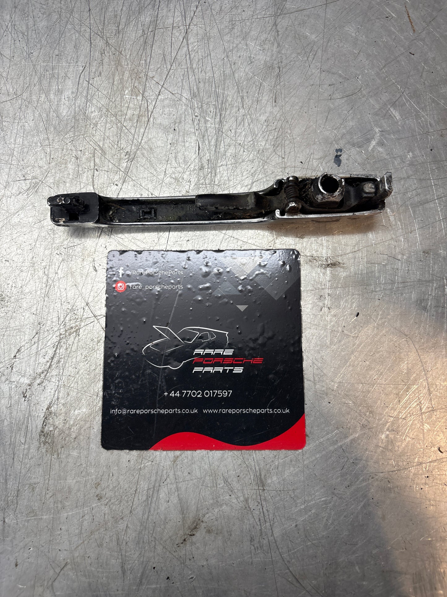 Porsche 924 early 76-79 Left or Right door handle without lock cylinder, chrome 477837037H, used