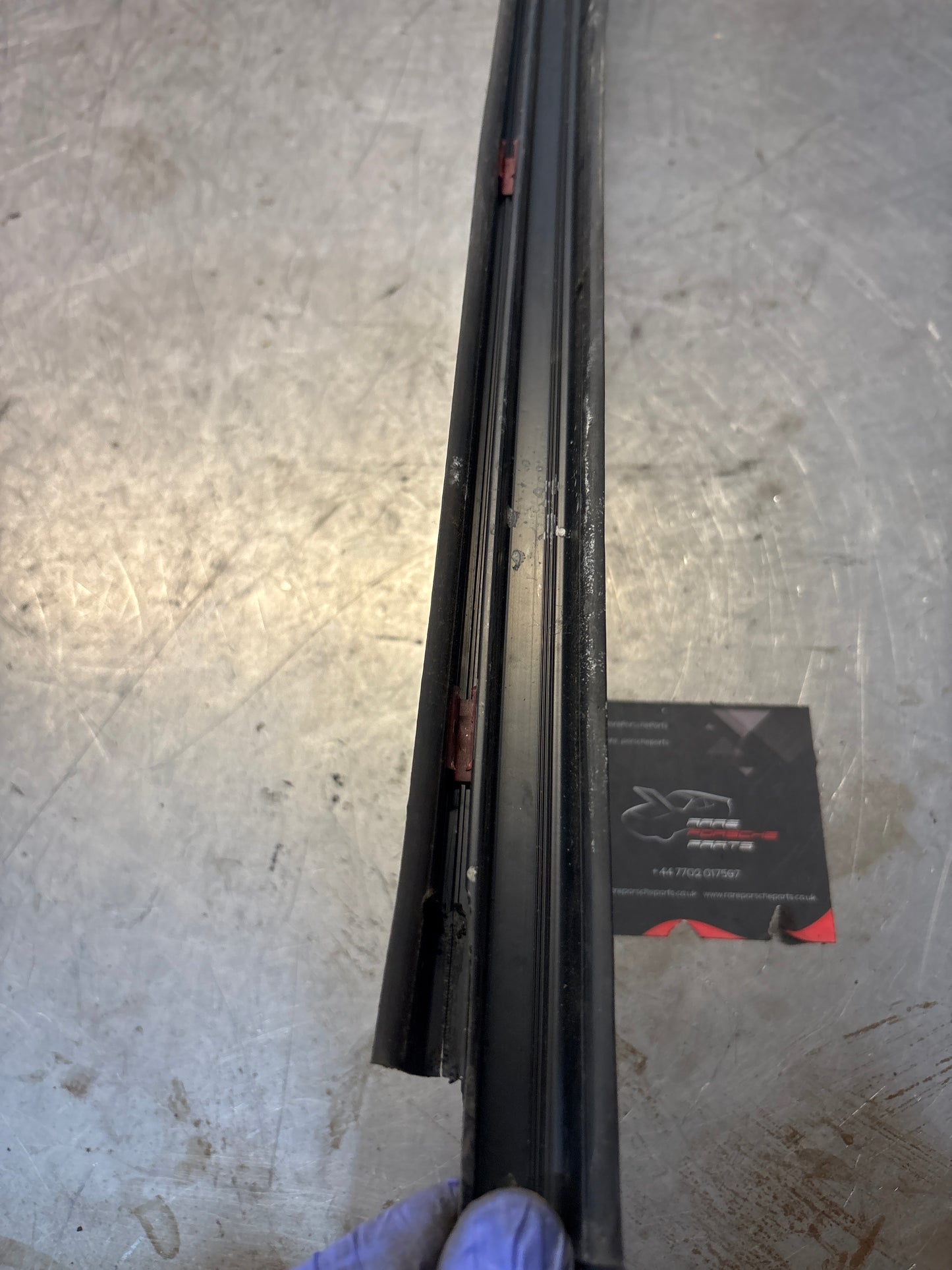 Porsche early 924/944 left sill trim, used 477853657A