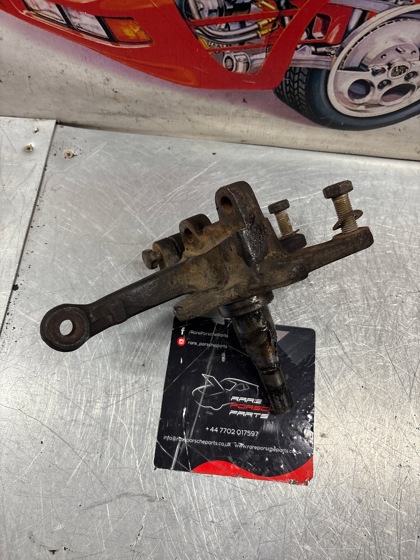 Porsche 944 Turbo front left steering knuckle, without abs, used 95134165501