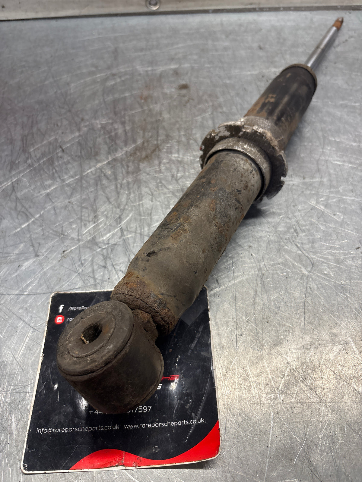 Porsche 911 964 rear shock absorber, used 96433305700