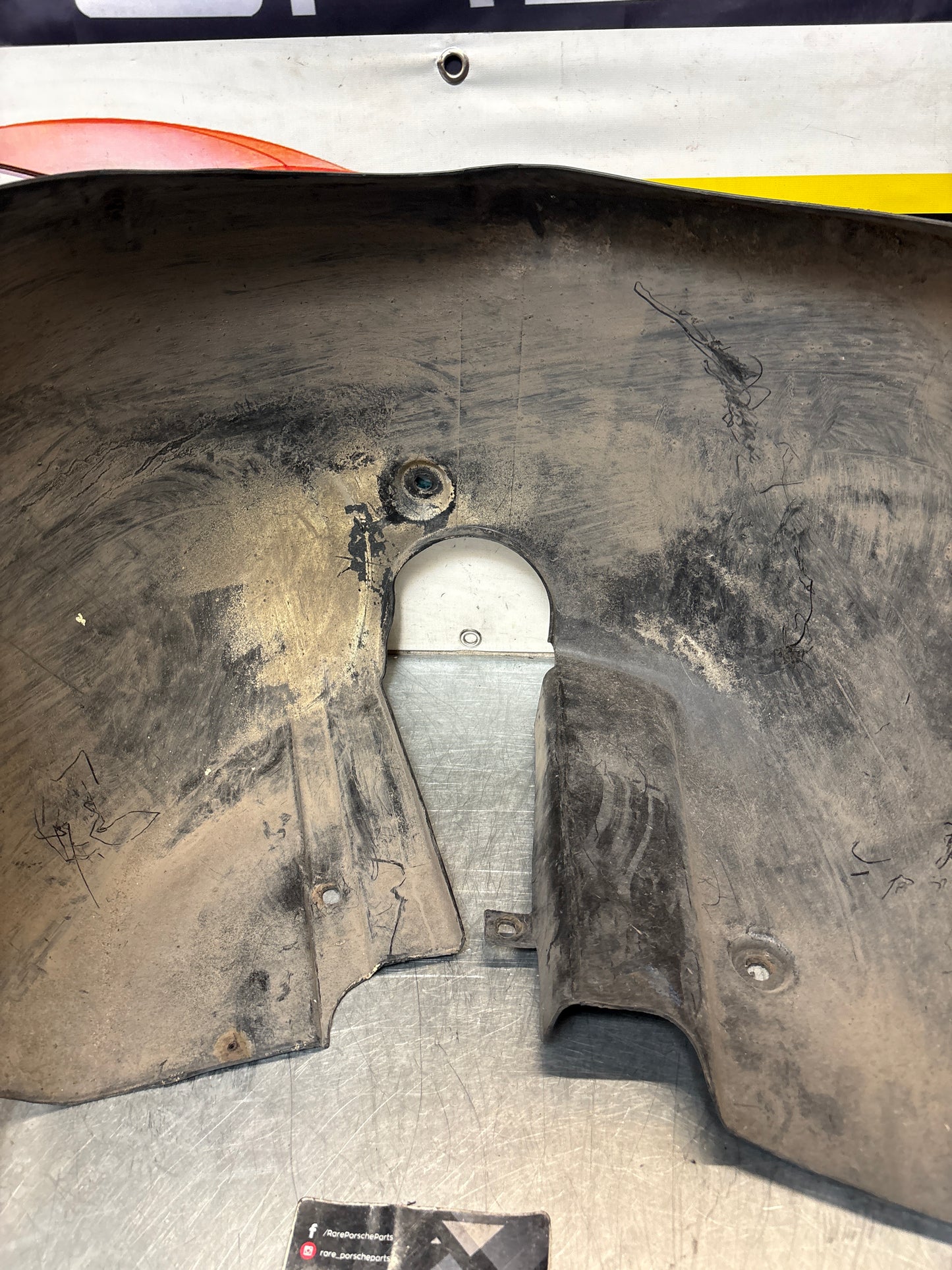 Porsche 944 from 85.5 wheel arch liner  Left, 94450438101 Used