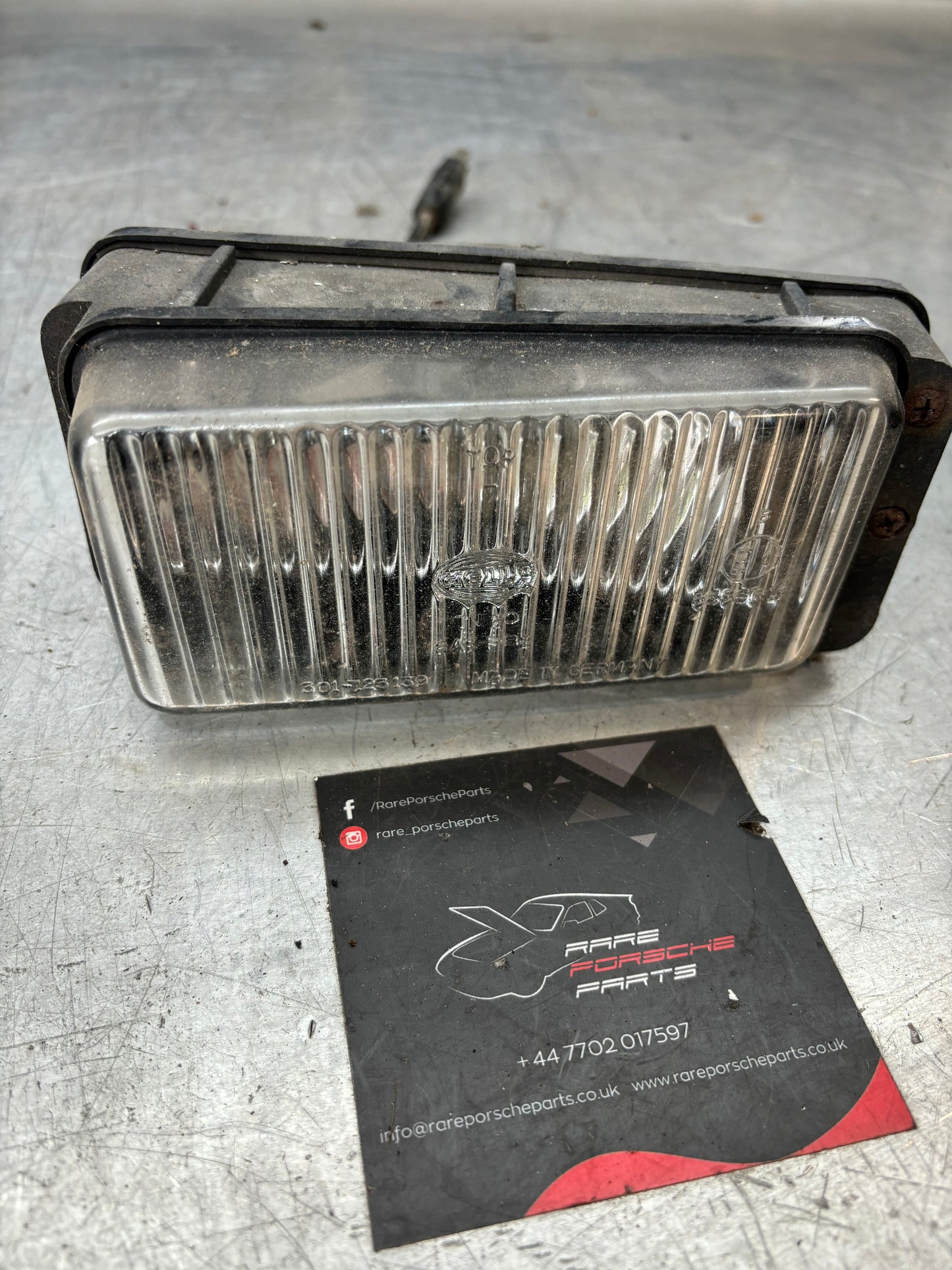 Porsche 944 early front left lower fog light 94463120101 used