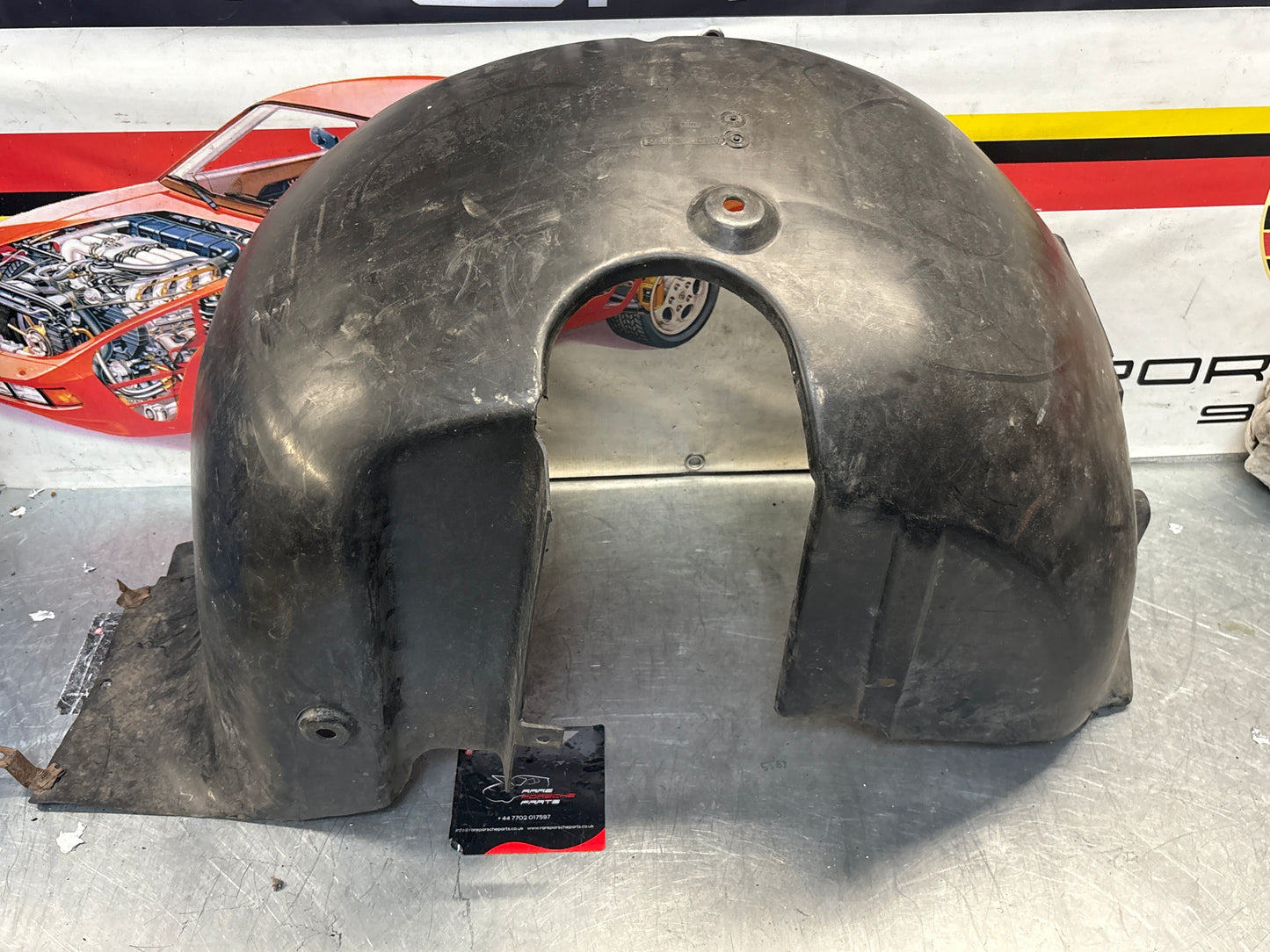 Porsche 944 from 85.5 wheel arch liner  Left, 94450438101 Used