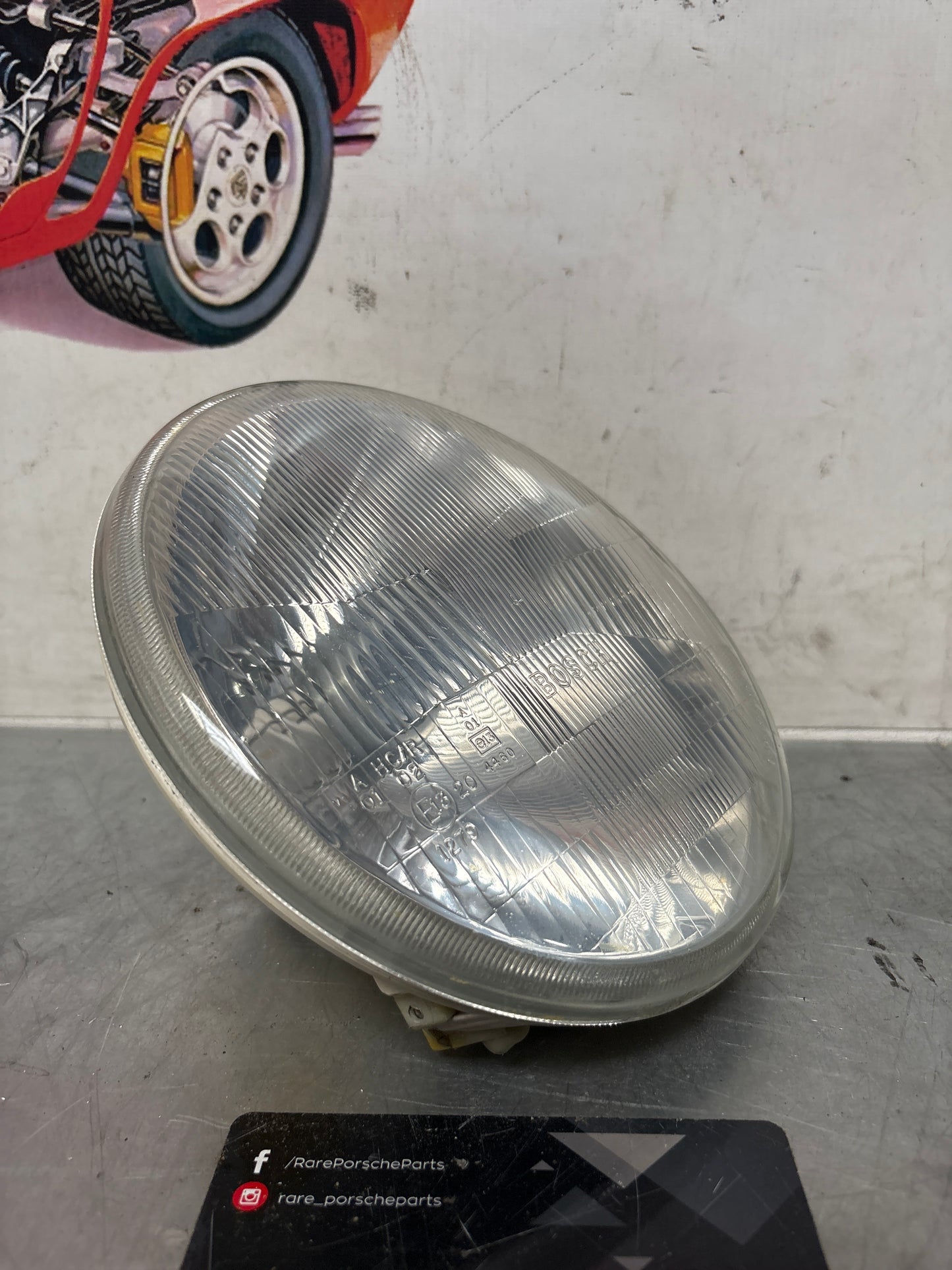 Porsche 968 right side Bosch headlight, used 94463192900 / 0301900306 / 1305304021