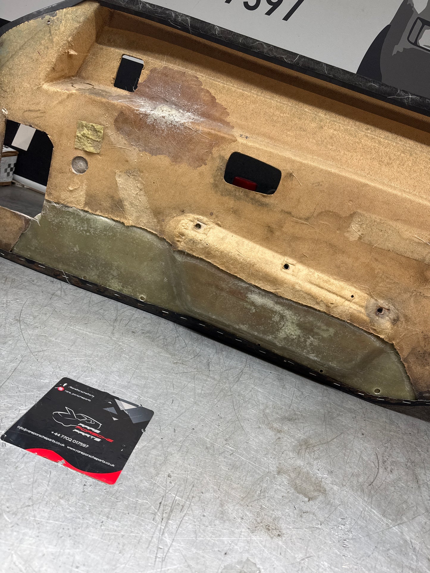 Porsche 924/ Early 944 black RHD Left door card. Fibreglass repaired. 477867012