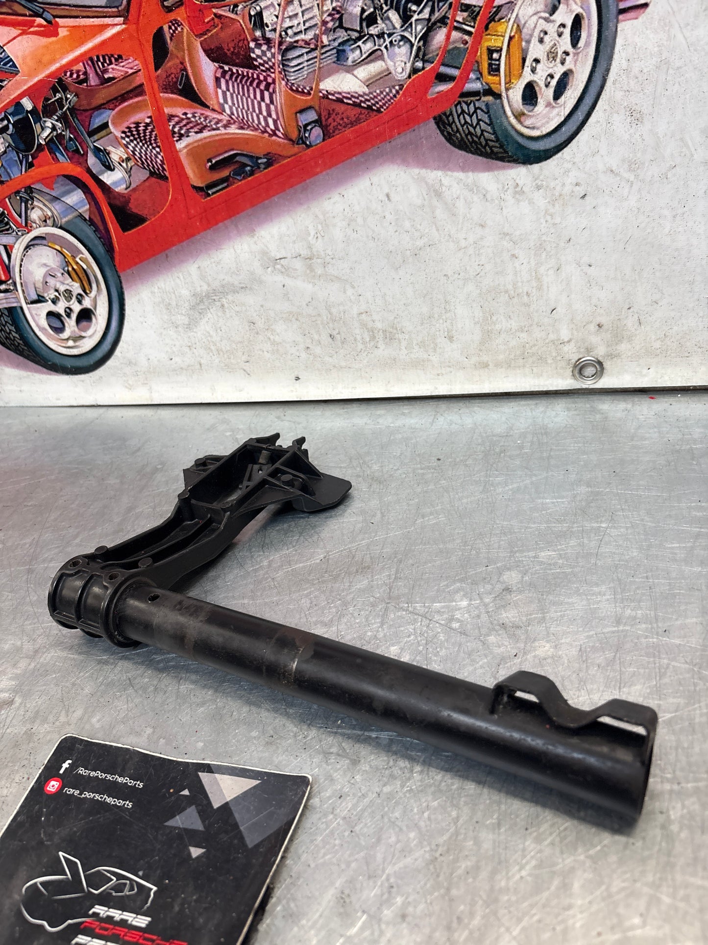 Porsche 928 headlight swivel driving arm, used 92875009805 / 92875024902