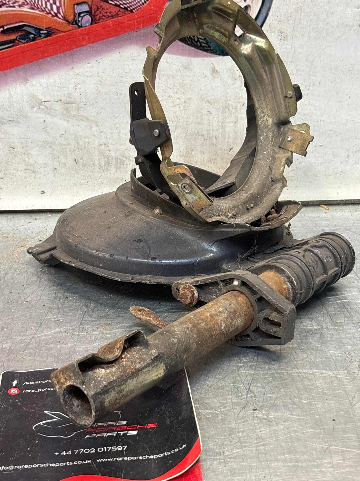 Porsche 928 right headlight swivel frame 92875024902 92875024302 used