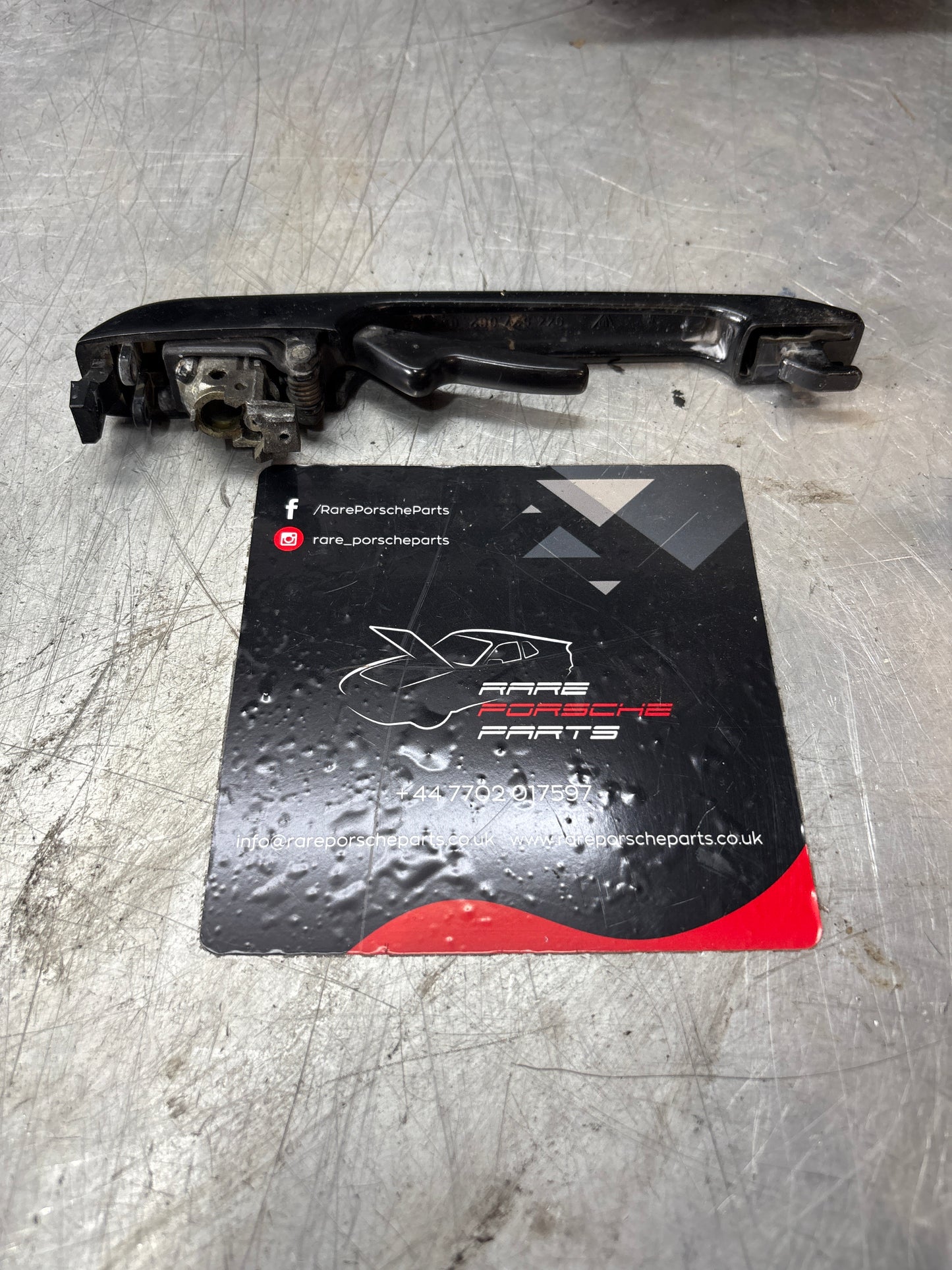Porsche 944 scripted right door handle, used 94453706200