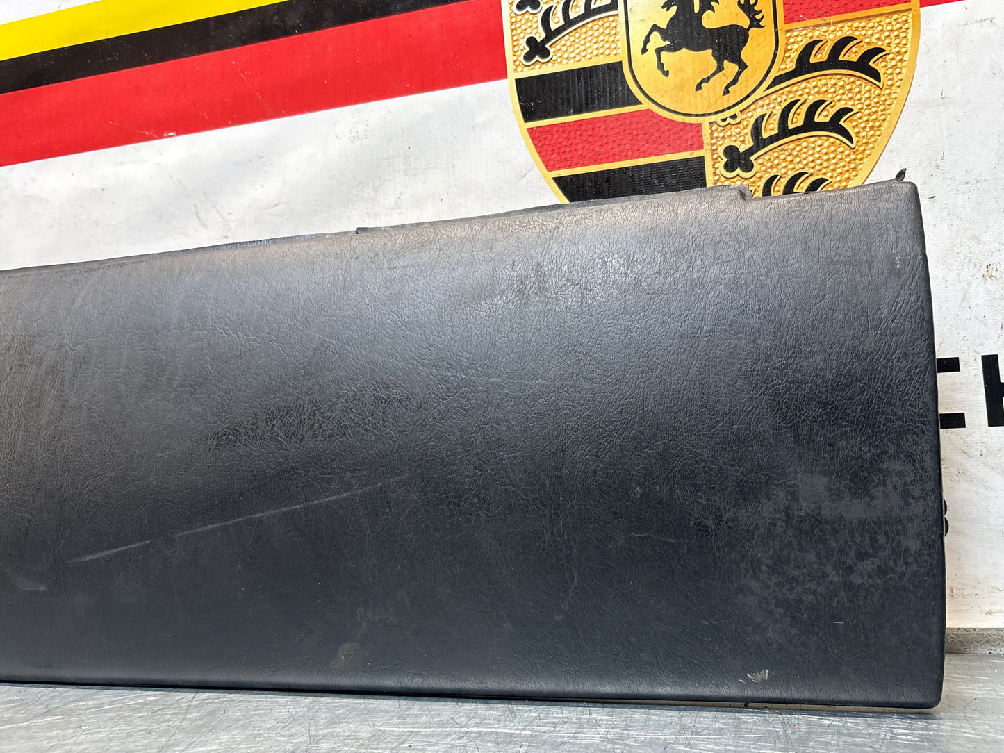 Porsche 911 964 dashboard lower knee protection trim, black leather, used 96455207304 / 96455207300