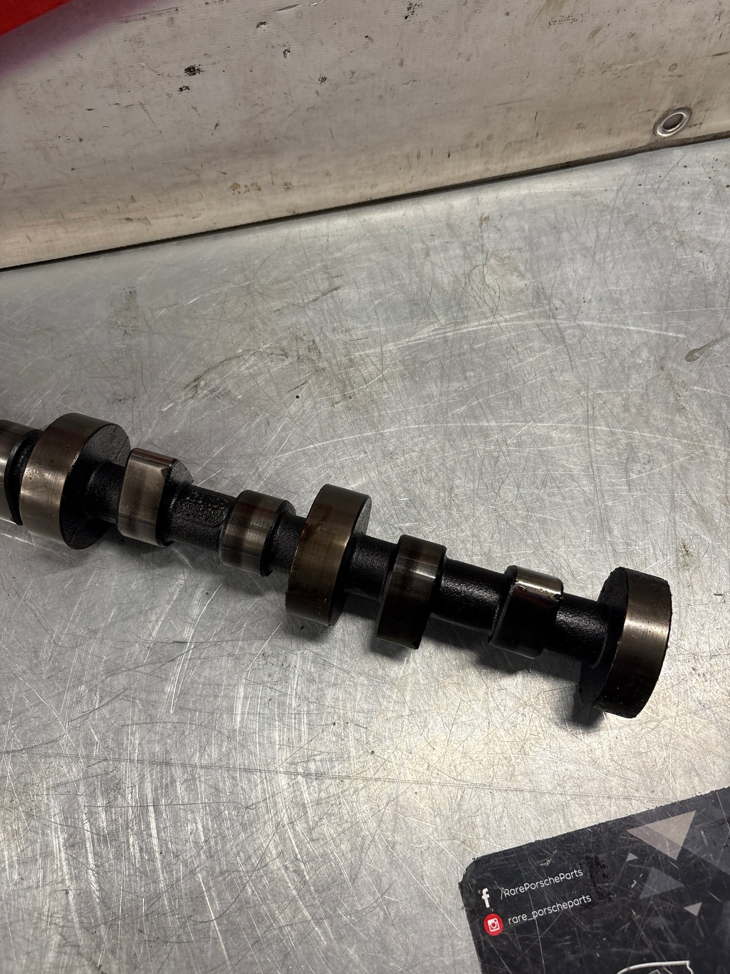 Porsche 928 cam shaft, used 9281051870R