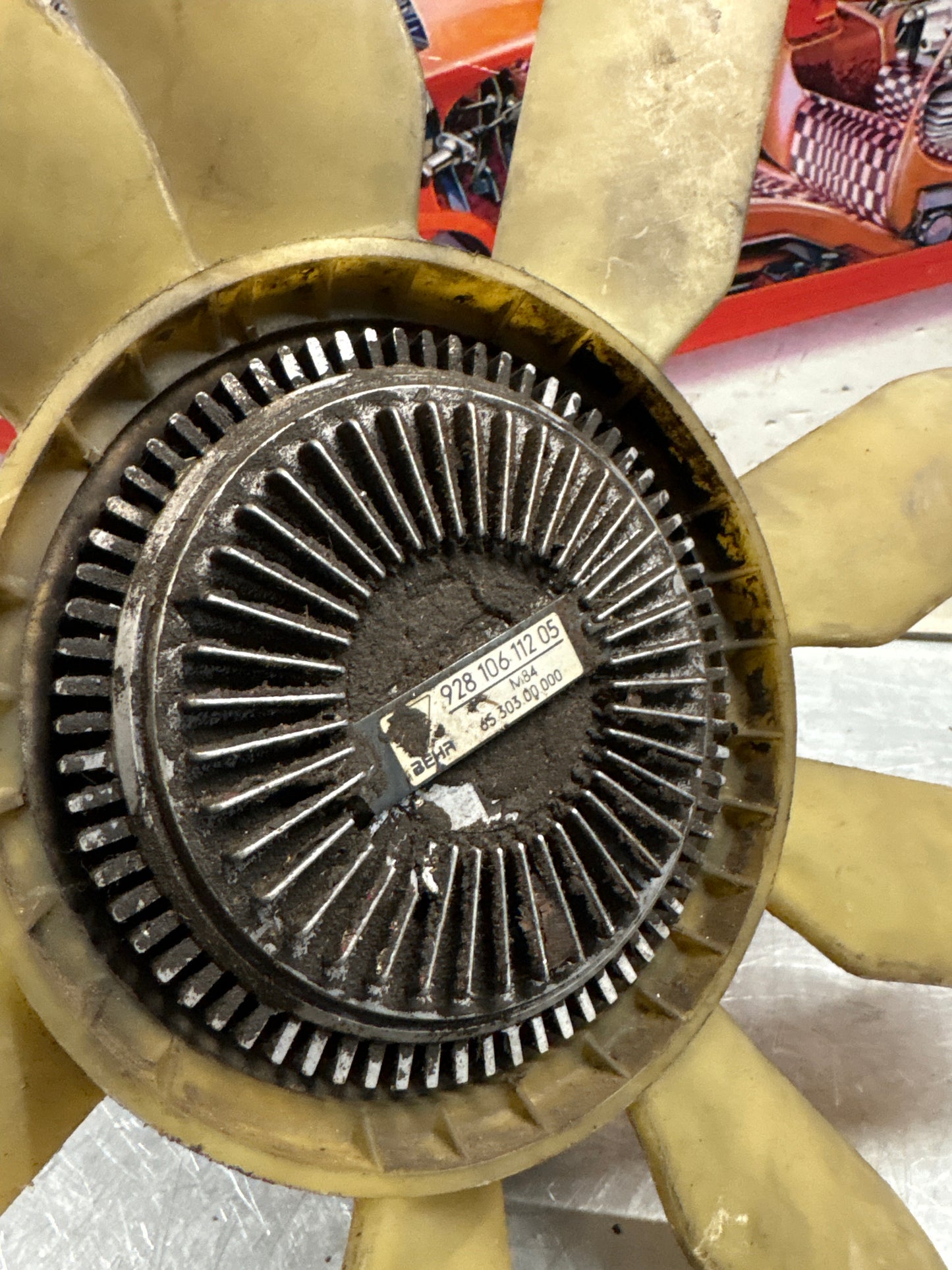 Porsche 928 late engine cooling fan clutch with bracket, used 92810611205 / 92810613701 / 9281061104R