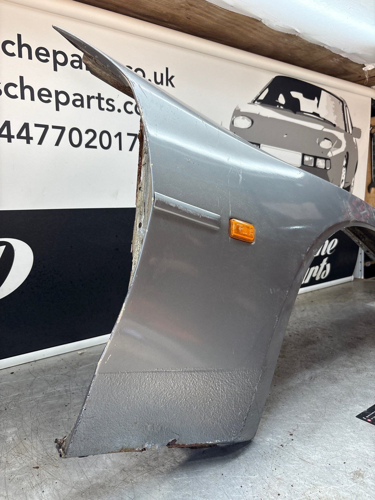 Porsche 944, early front right wing, in need of repair