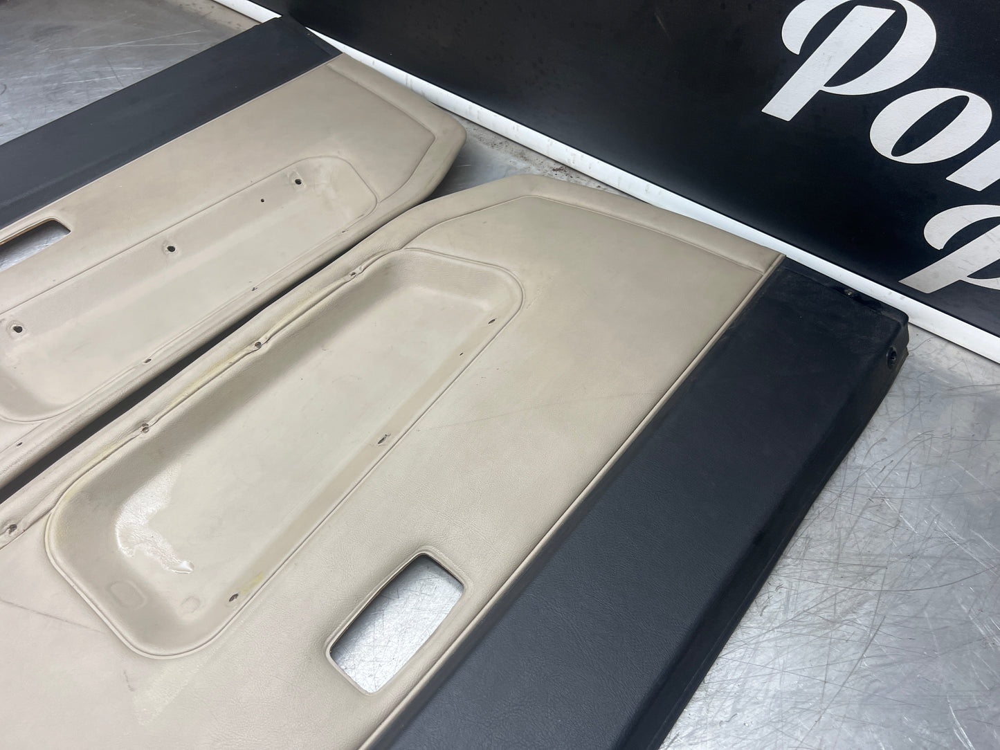 Pair Of Porsche 944 black / cream / white door cards 94455501701 94455501801 used, nice condition.
