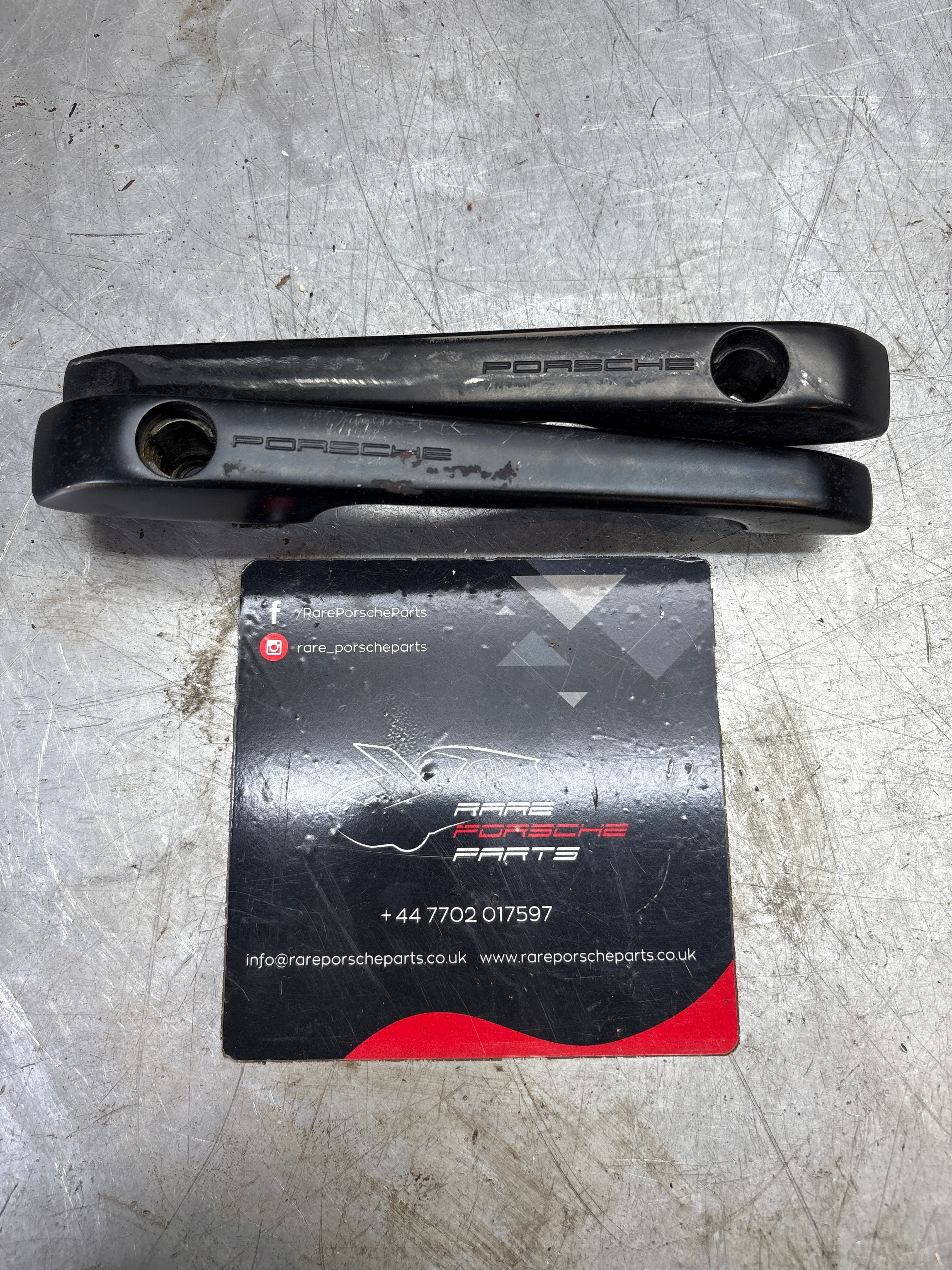 Porsche pair of 944 scripted door handle, used 94453706100