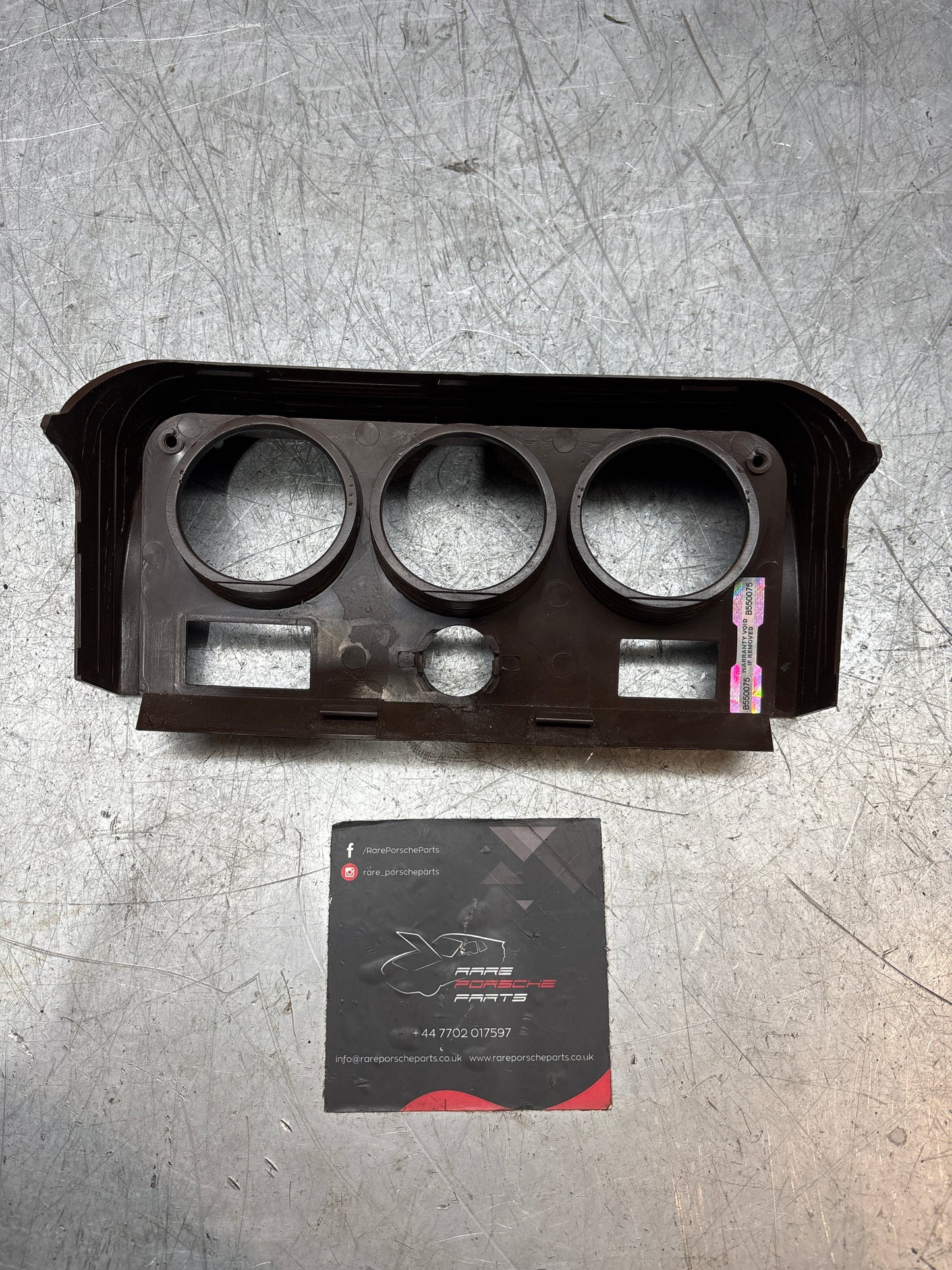 Porsche 924 centre console clock/gauge mounting panel in Brown/black 477857977C