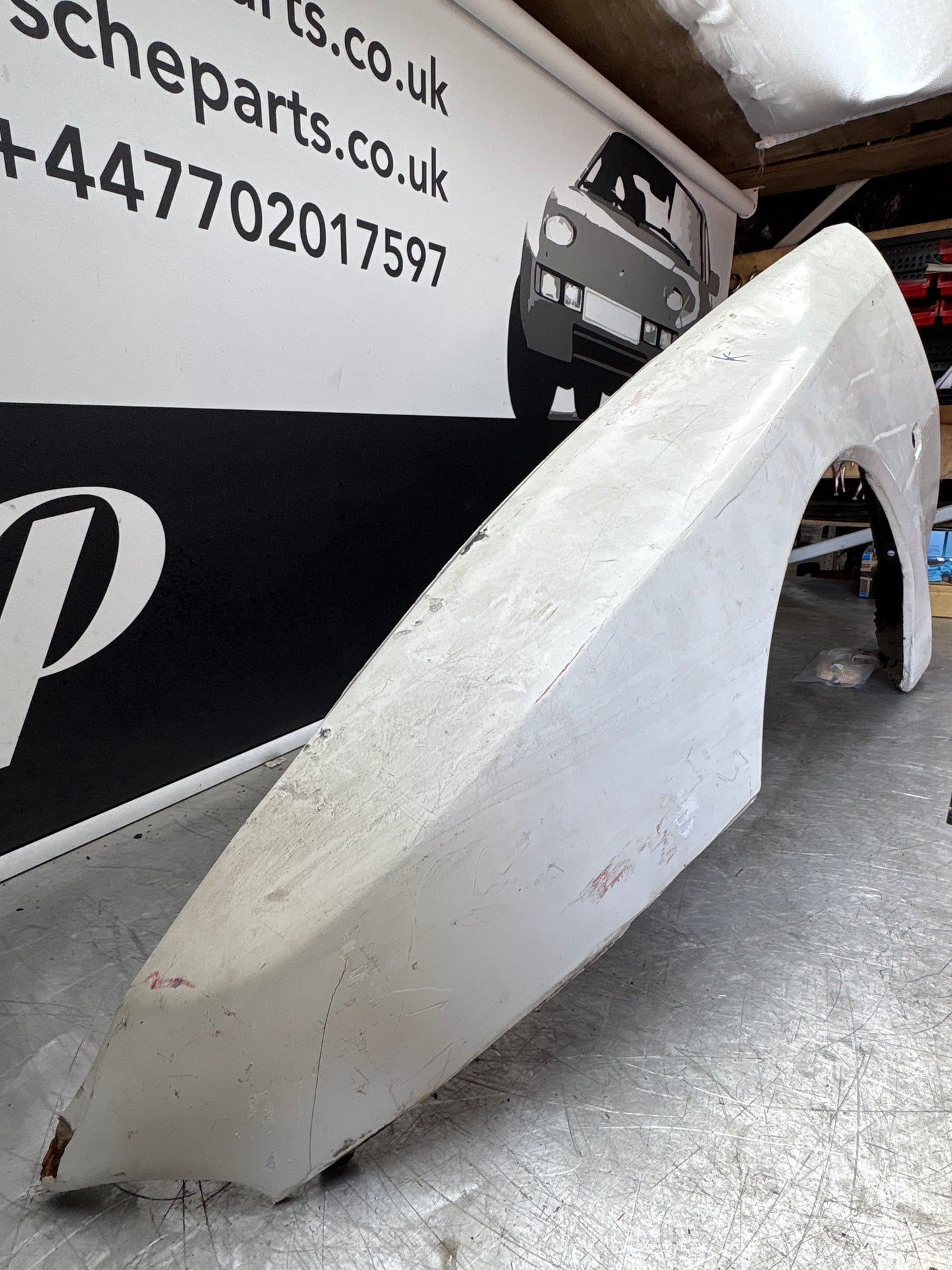 Porsche 944 early left front wing, please see photos, used