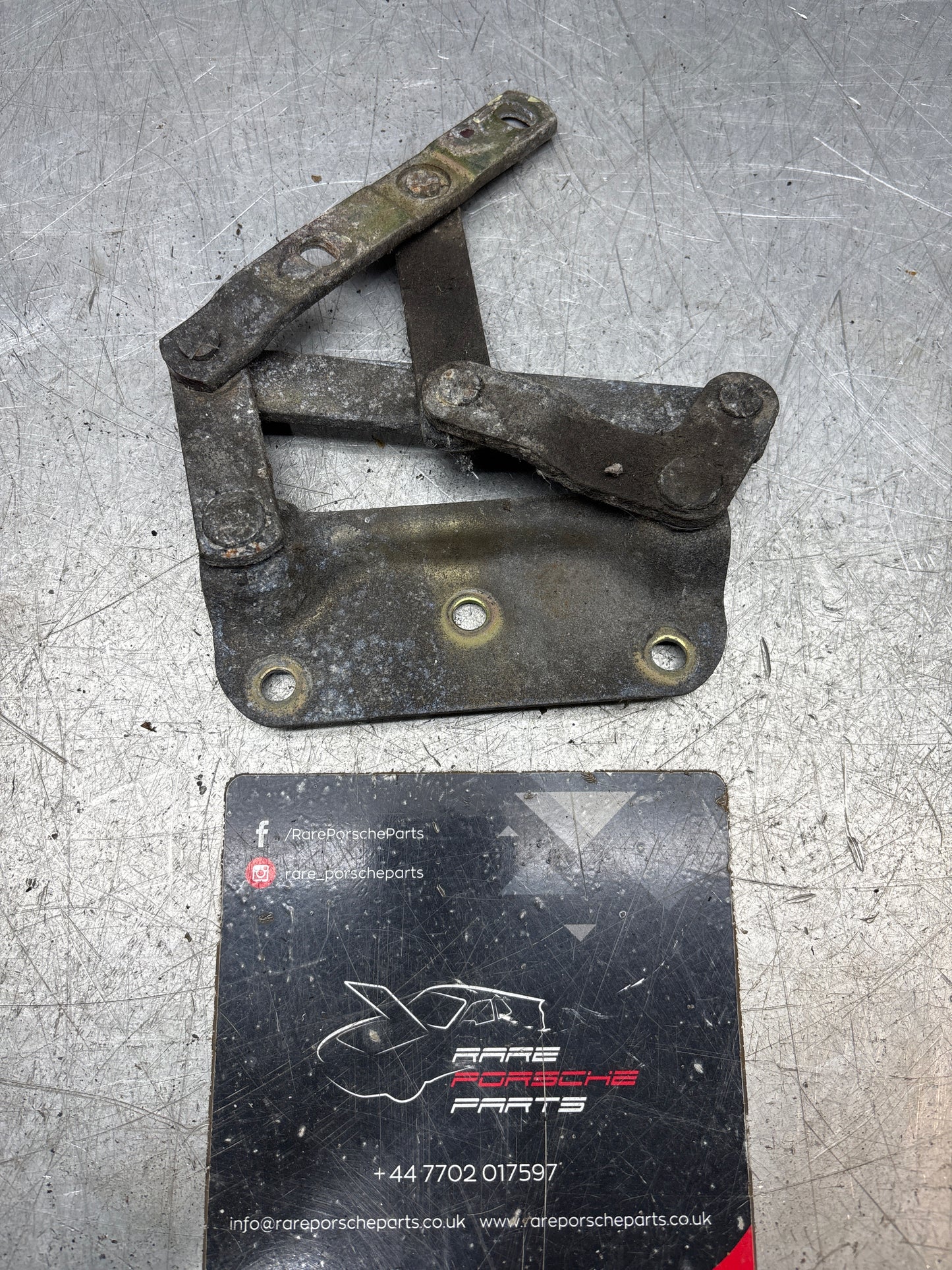 Porsche 928 left hand side bonnet hinge, used 92851104104