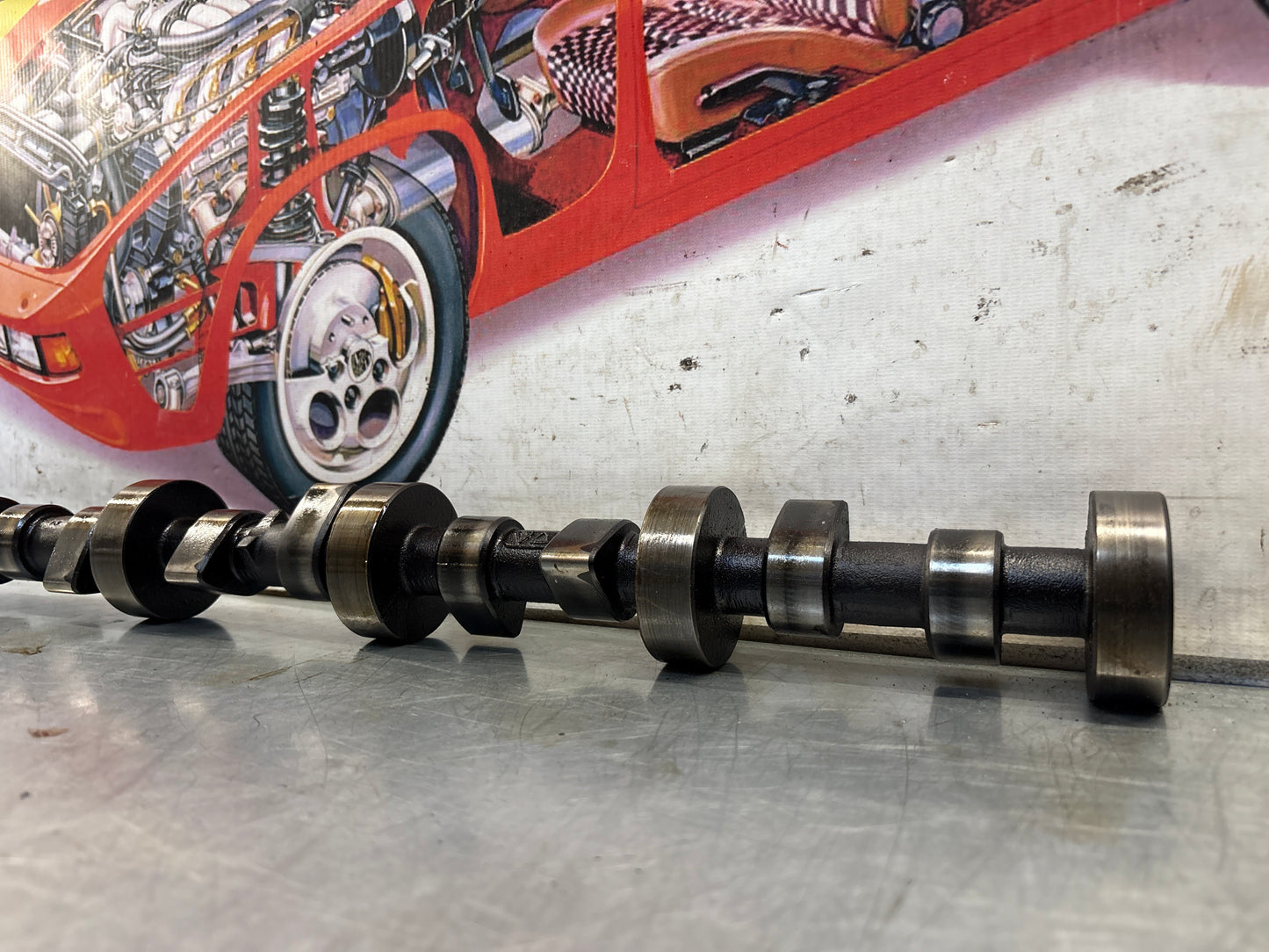 Porsche 928 cam shaft, used 9281051870R