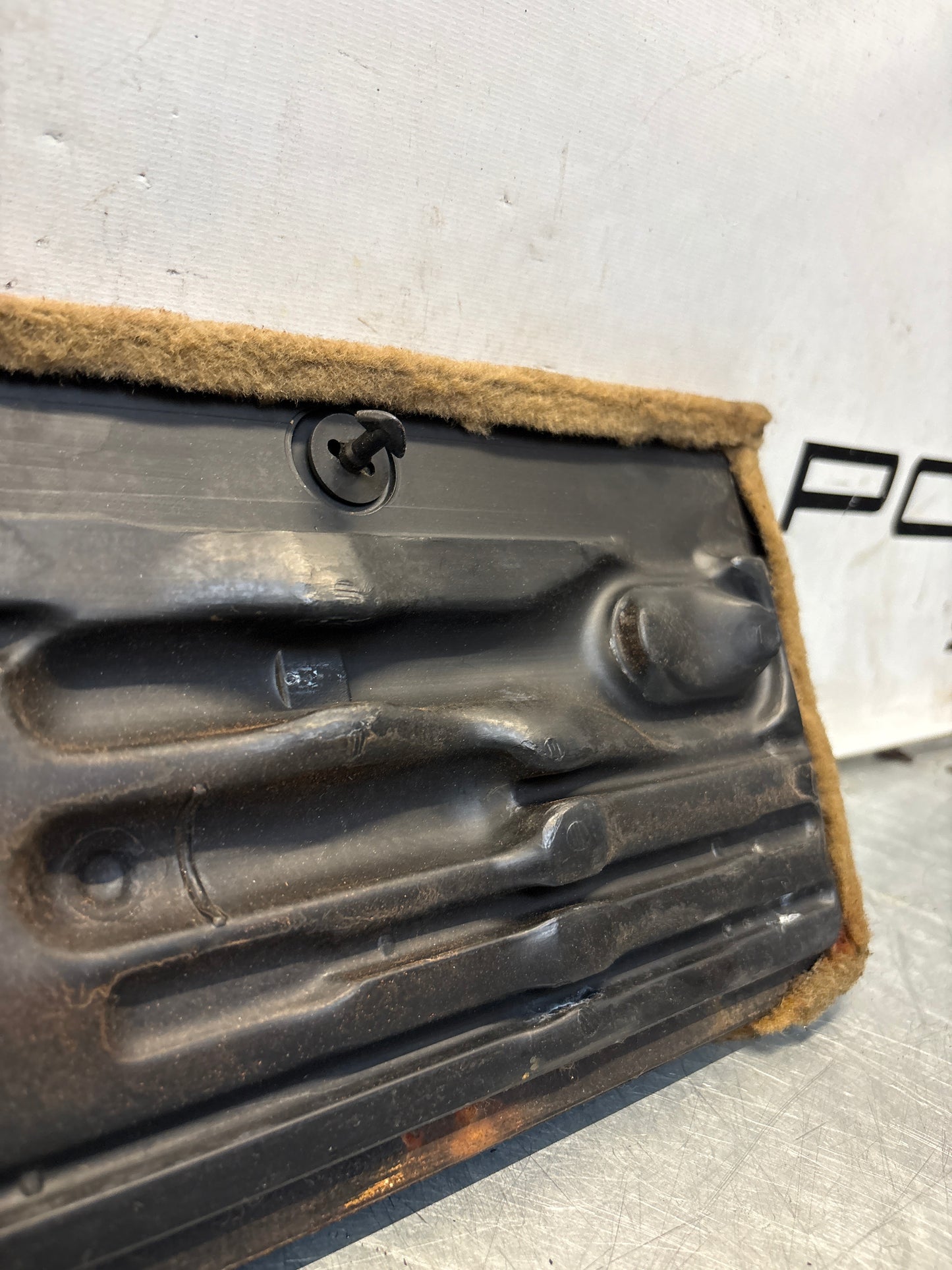 Porsche 928 greyish-beige carpeted Tool kit panel cover, used 92855118105