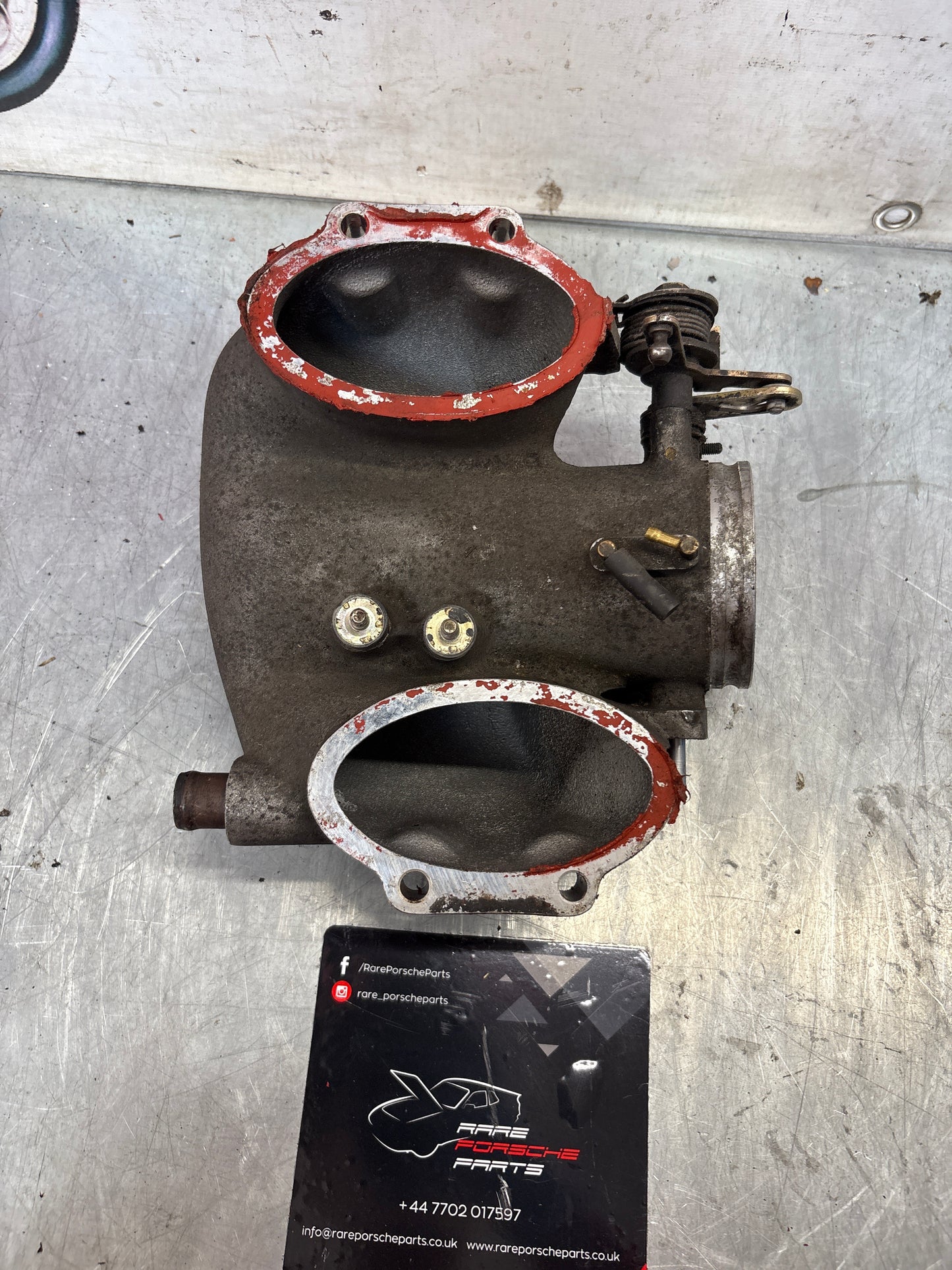 Porsche 928 throttle body intake bridge idle speed control valve, used 9281101210R
