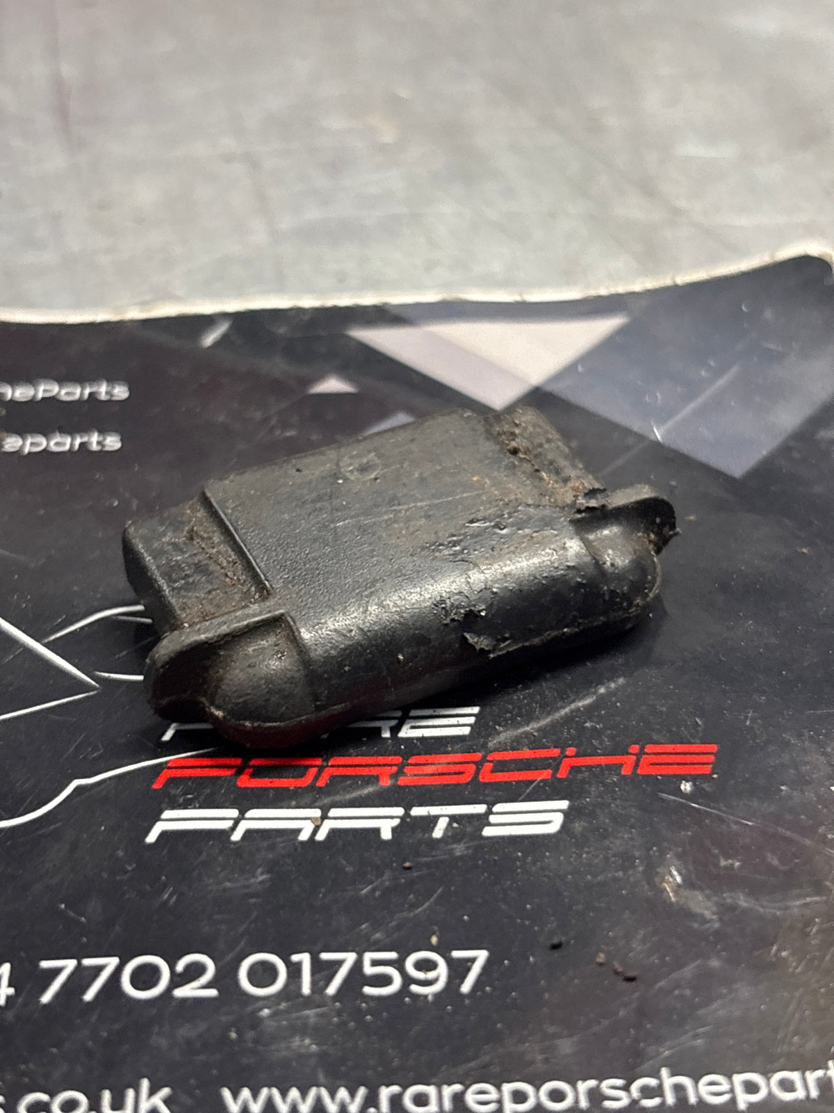 Porsche 914 seat rail end plug, used 311881347