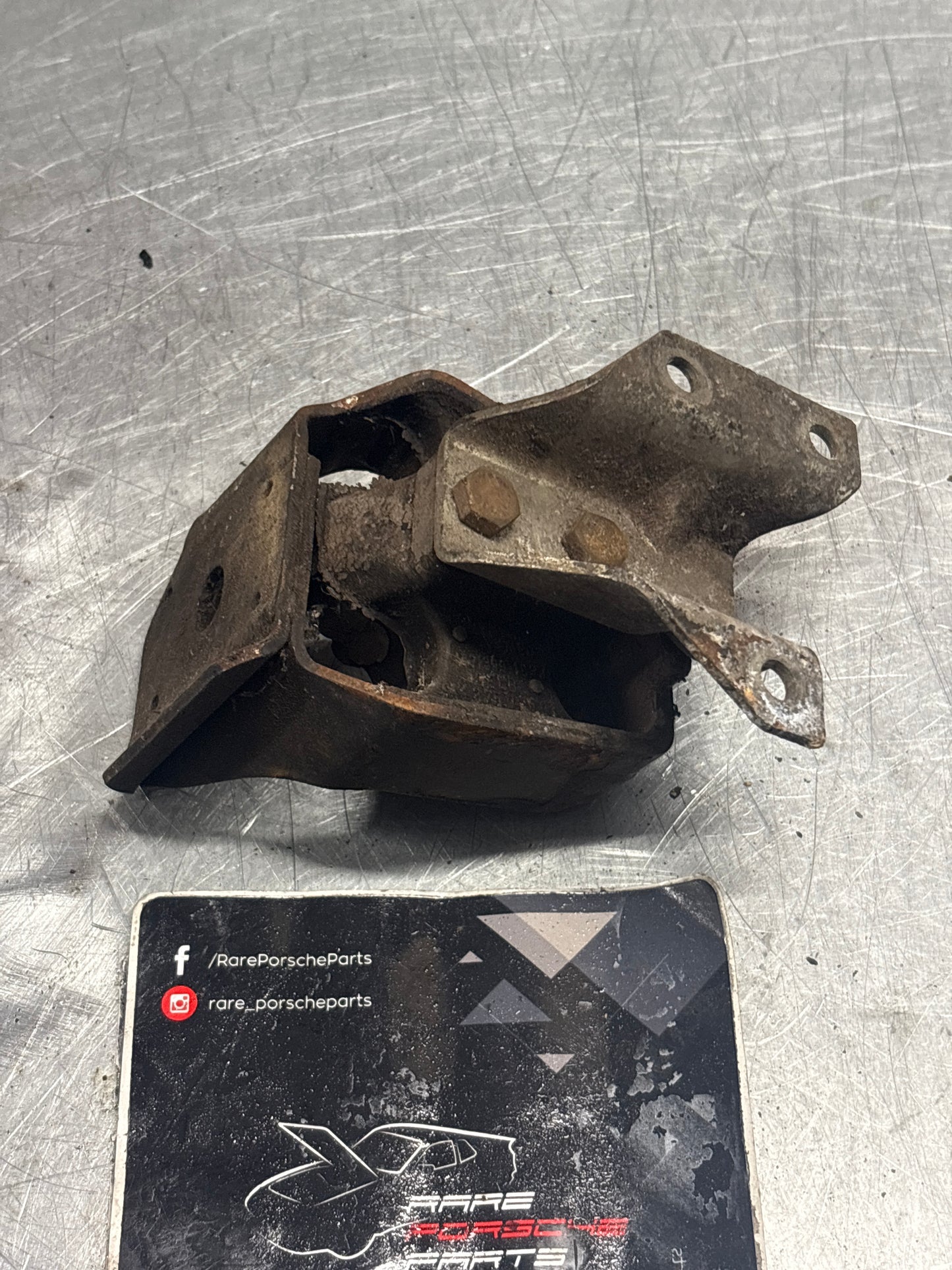 Porsche 924/944 gearbox mount, 477399153J / 94437504500, used