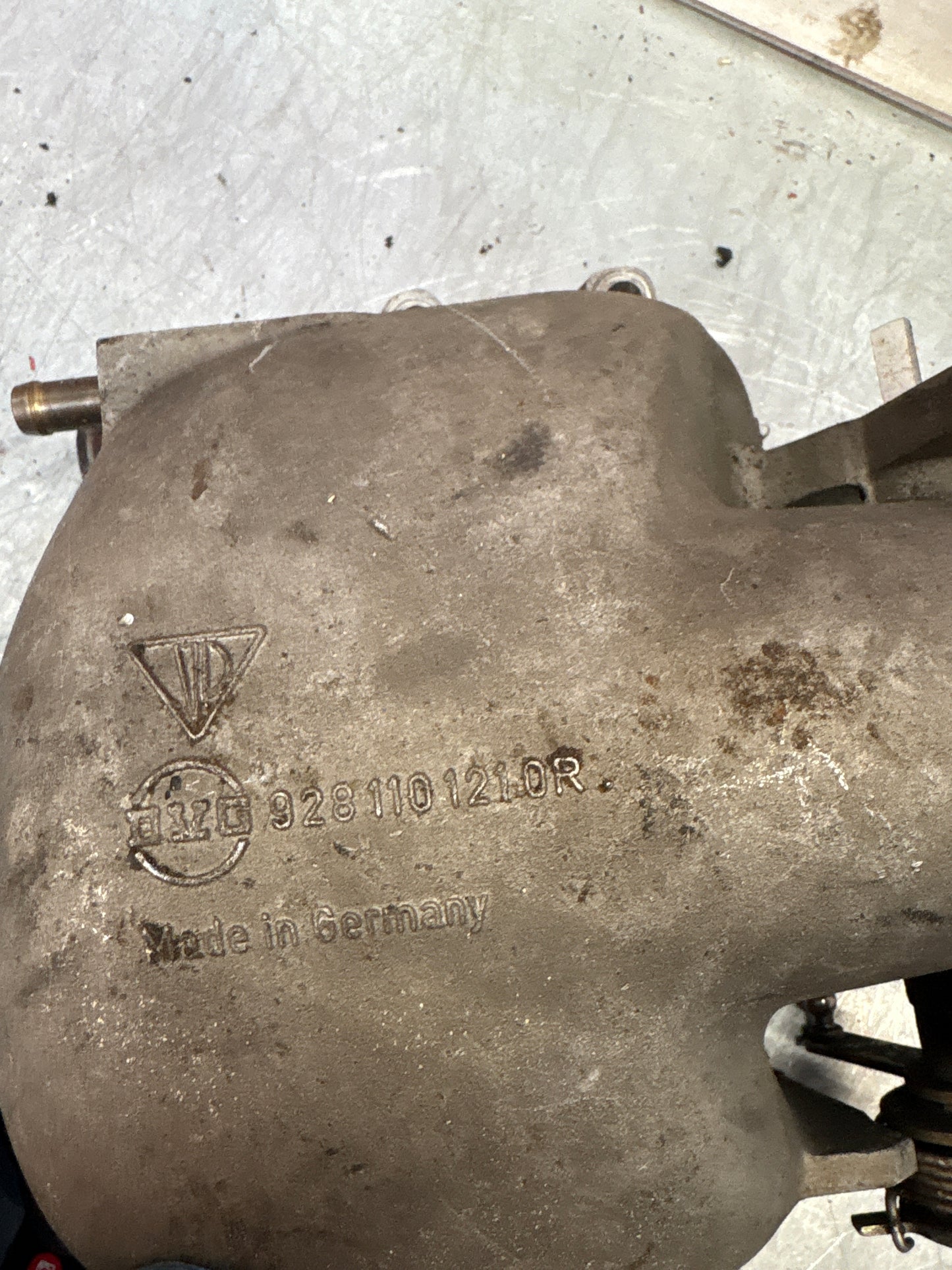 Porsche 928 throttle body intake bridge idle speed control valve, used 9281101210R