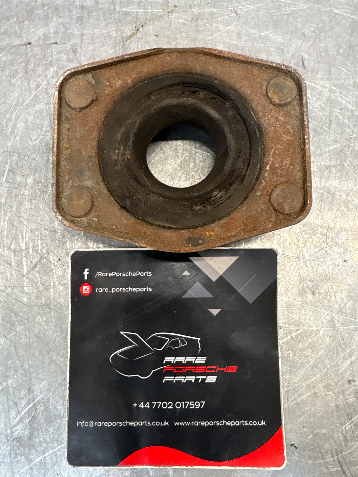 Porsche 924 / 944 front suspension bearing flange, 477412345, used