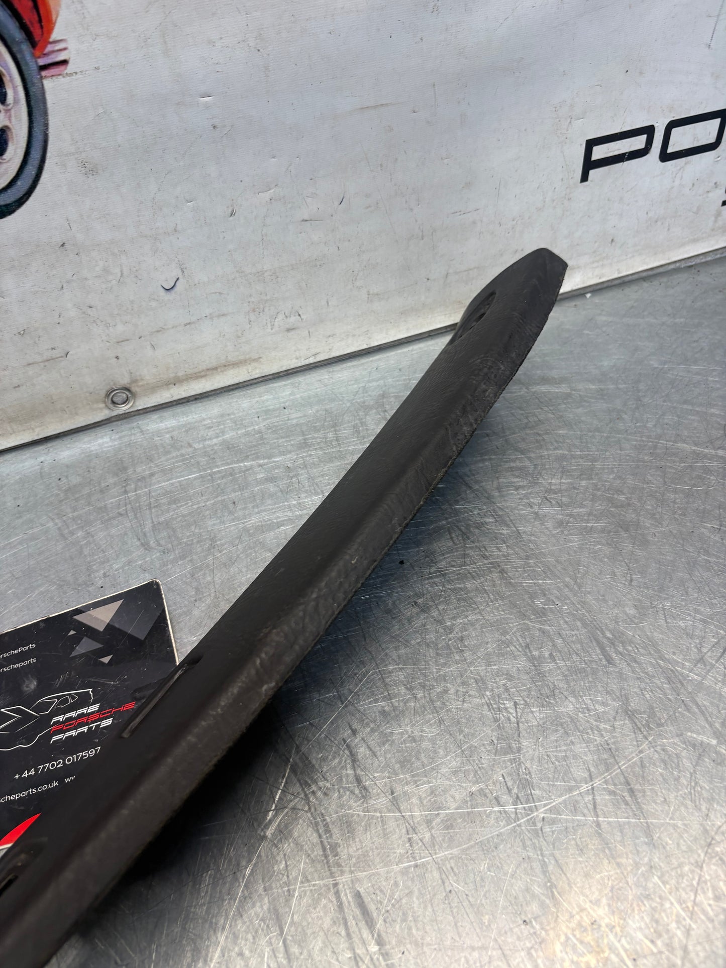 Porsche 924 944 -85.5 front roof / sun visor trim, black 477867511, used