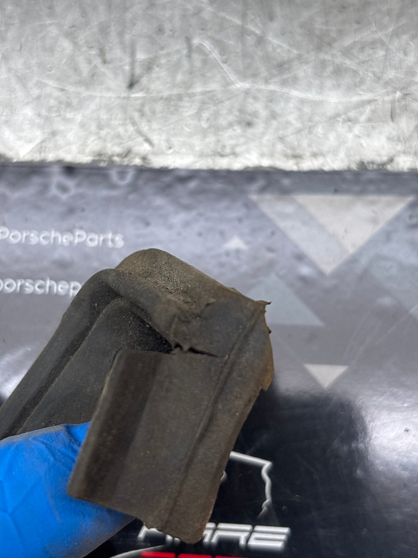 Porsche 944, S2/ 924S right tailgate latch pin gasket rubber, used 94451236601