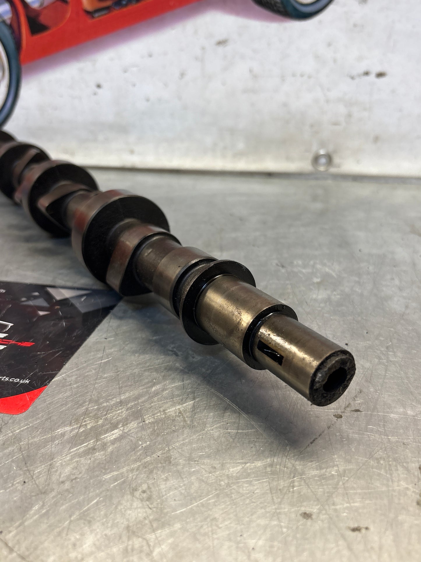 Porsche 928 cam shaft, used 9281051563R