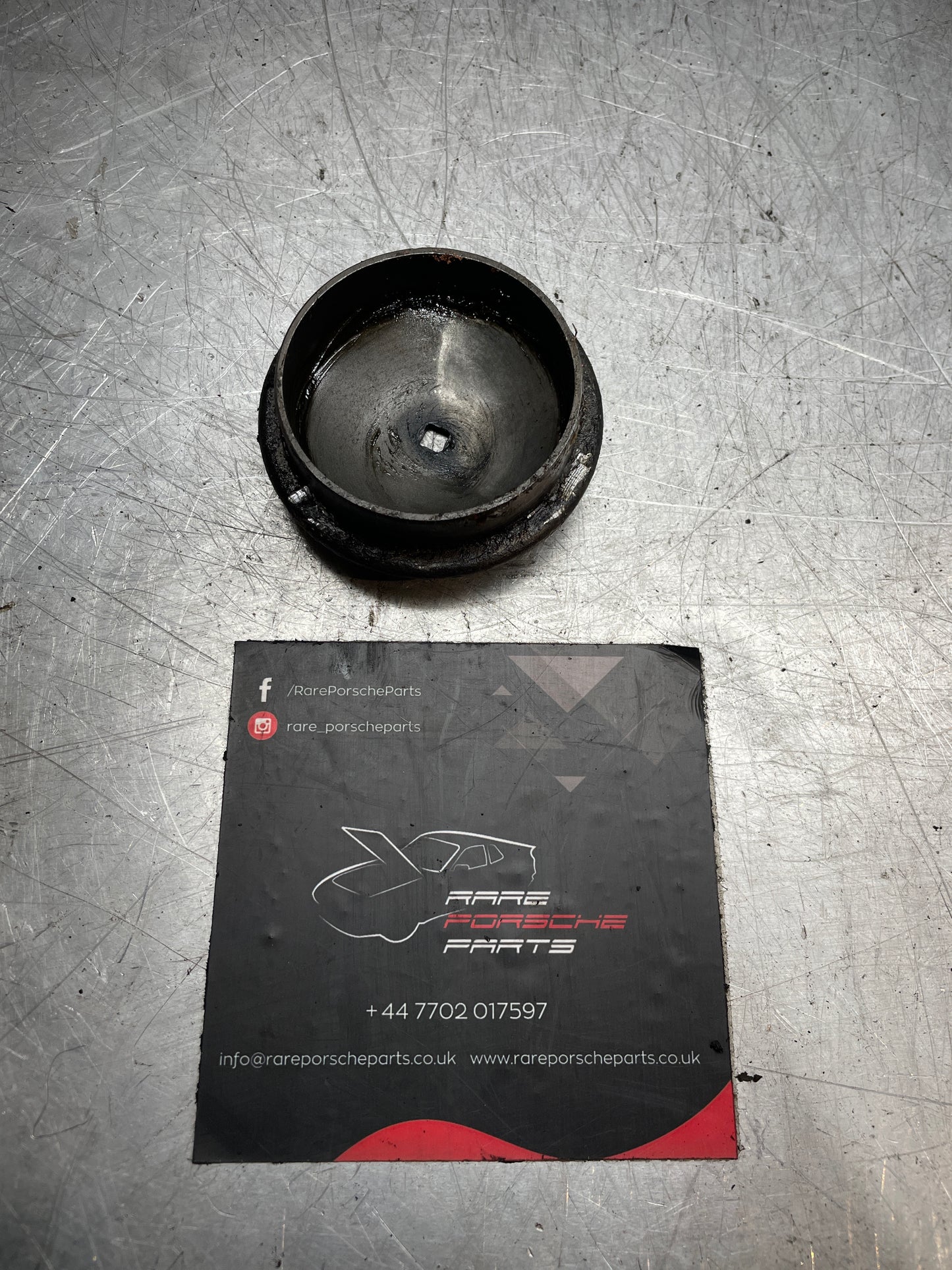 Porsche 944 disc brake grease cap, used 477405691C