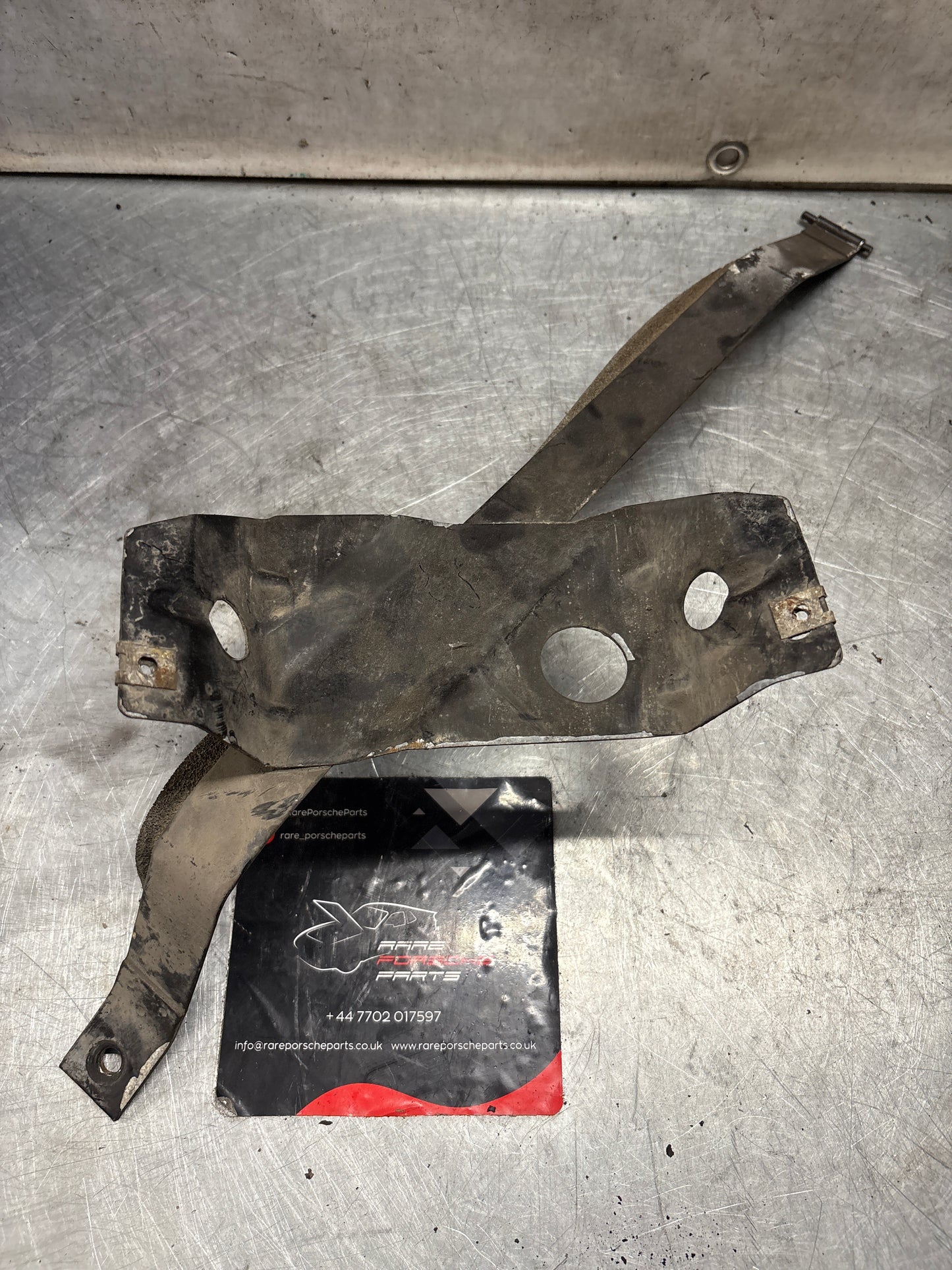 Porsche 944 S2 / Turbo 90- left fuel tank restraining strap, used 95120131502