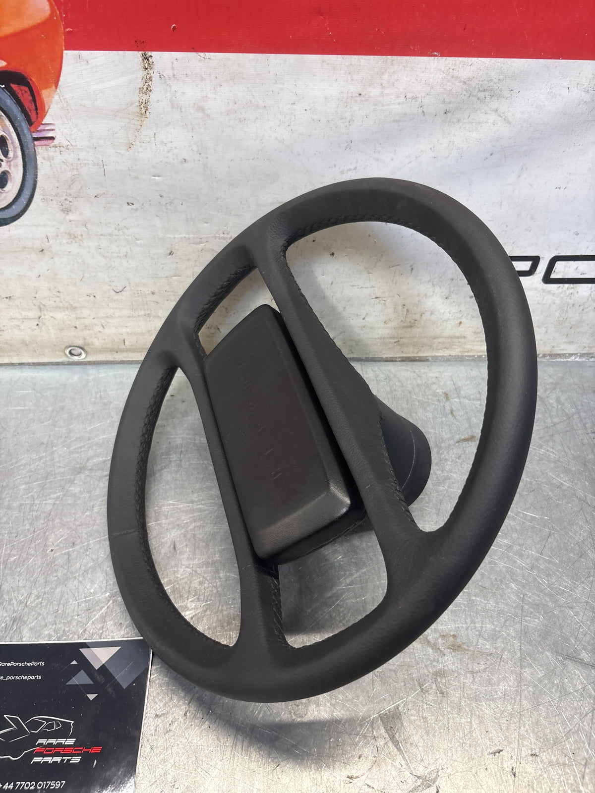 Porsche 928 steering wheel 92834708402, refurbished