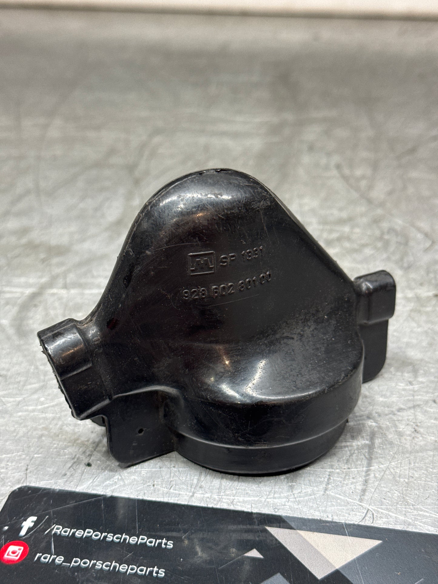 Porsche 928 coil cap / protector. Used. 92860280100