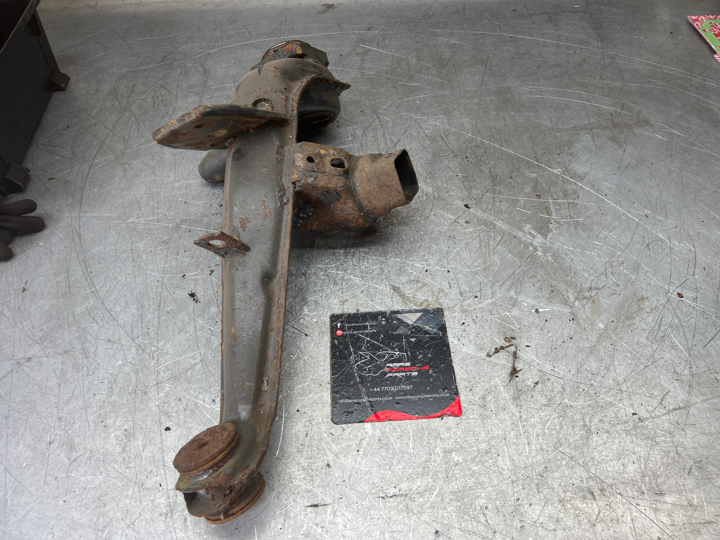 Porsche 924 944  -85.5 Rear left trailing arm, 94433102100
