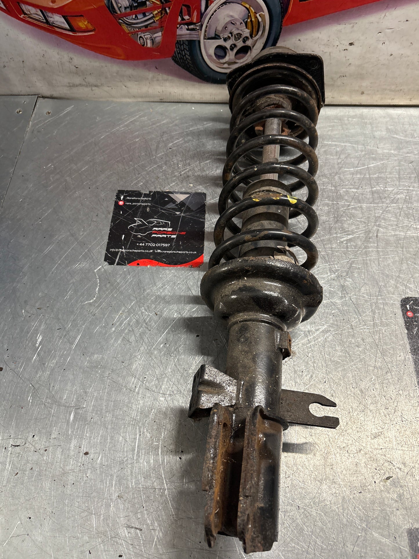 Porsche 944 Turbo front left shock absorber, used 95134303105