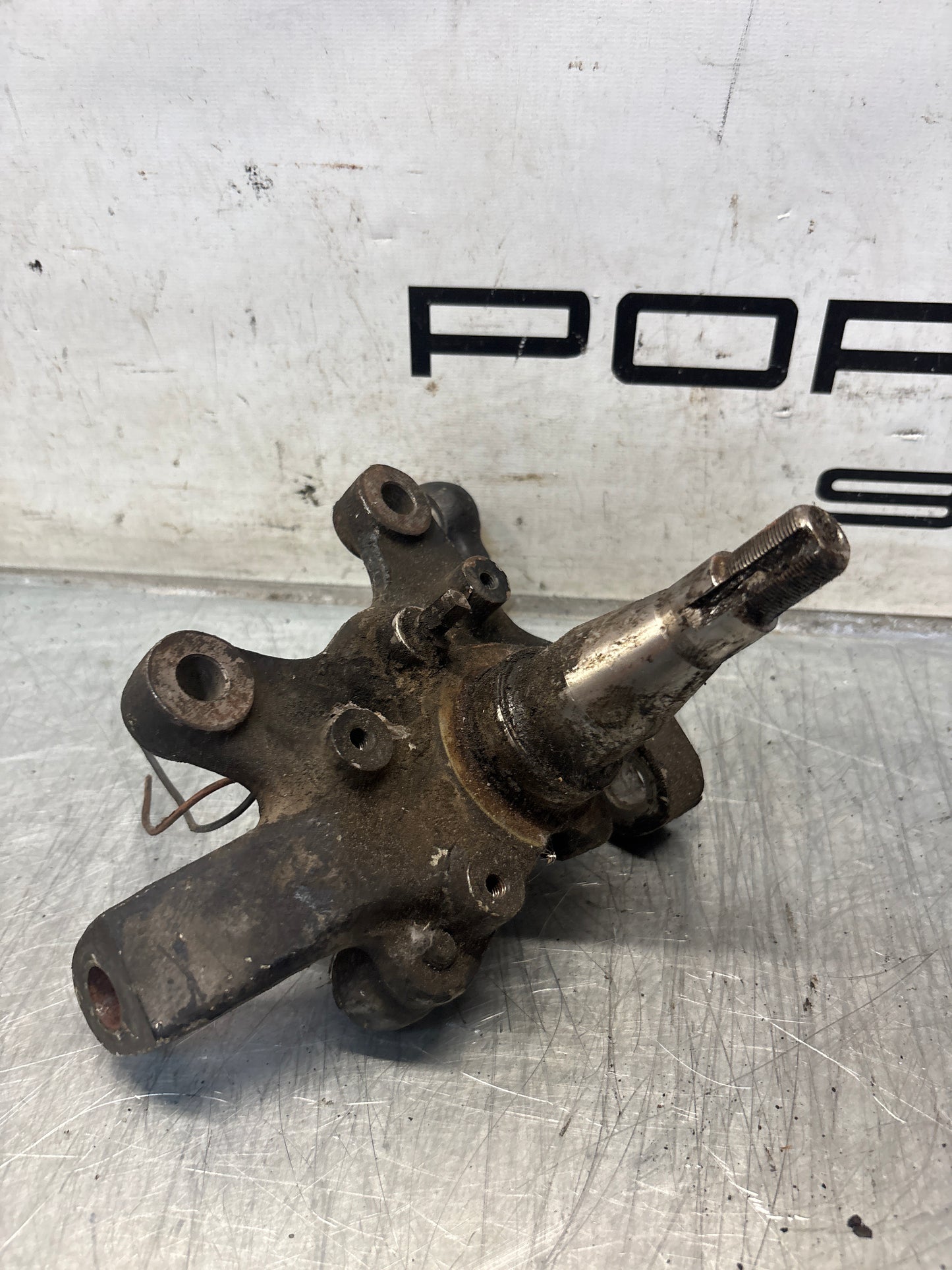Porsche 928 left steering spindle knuckle, used 92834105717