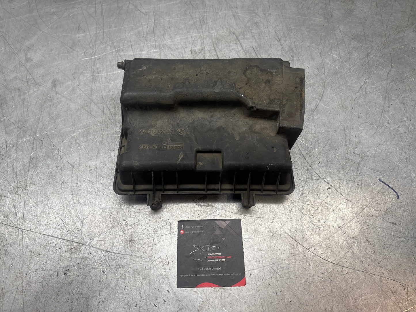 Porsche 944 Turbo air filter housing bottom part, 95111002102, used spares or repair
