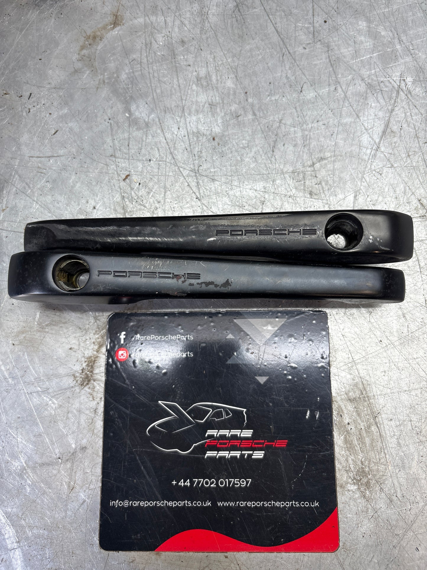 Porsche pair of 944 scripted door handle, used 94453706100 / 94453706200