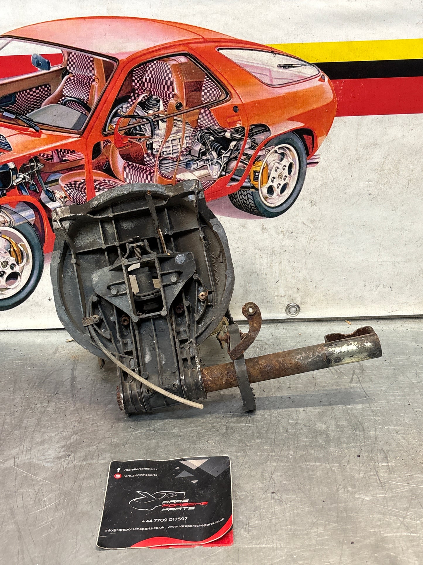 Porsche 928 right headlight swivel frame 92875024902 92875024302 used