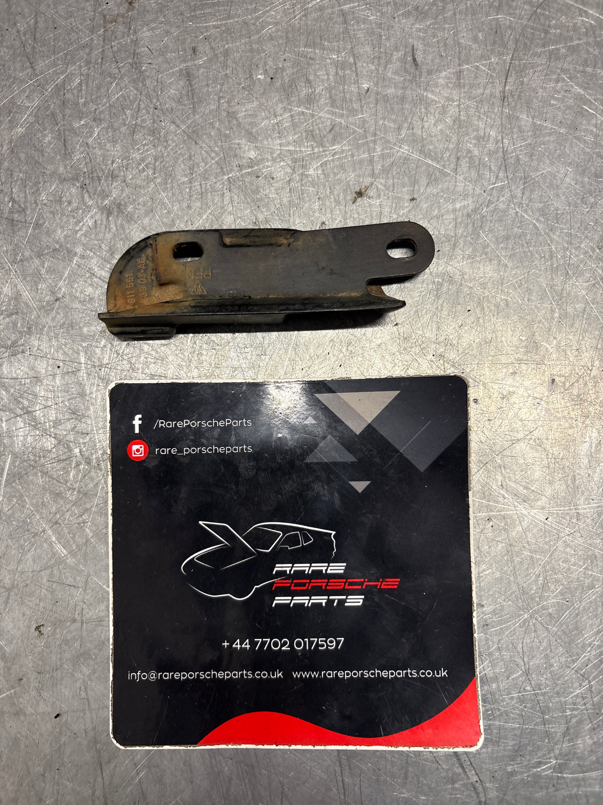 Porsche 911 964 cabriolet left roof latch guide plate, used 91156173903