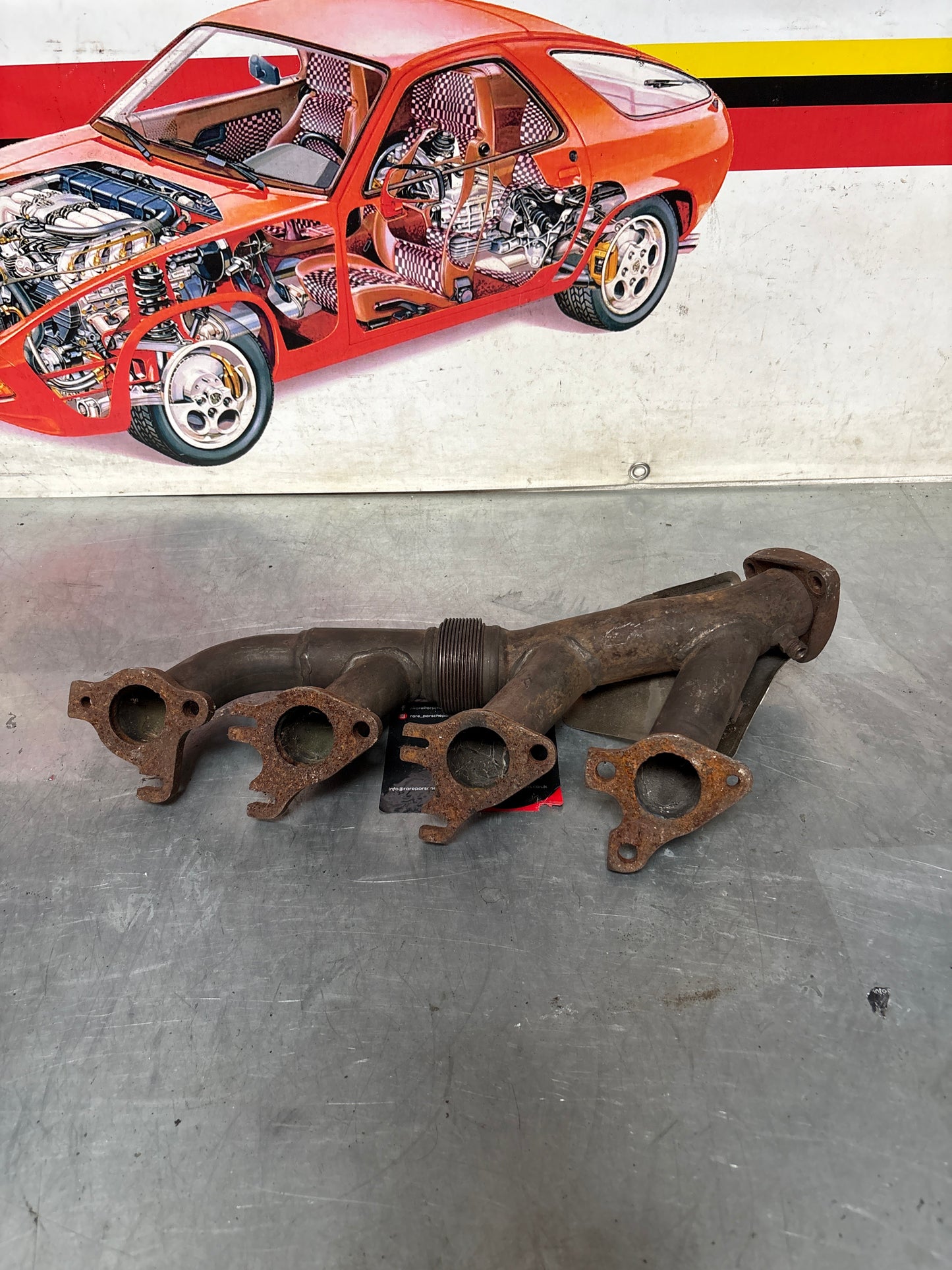 Porsche 928 S4 exhaust manifold, left 92811114507, used