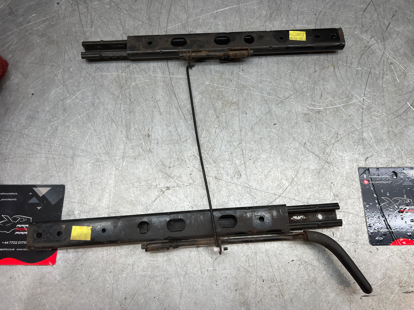 Porsche 944/968 pair of late type seat runners, manual, left side, used