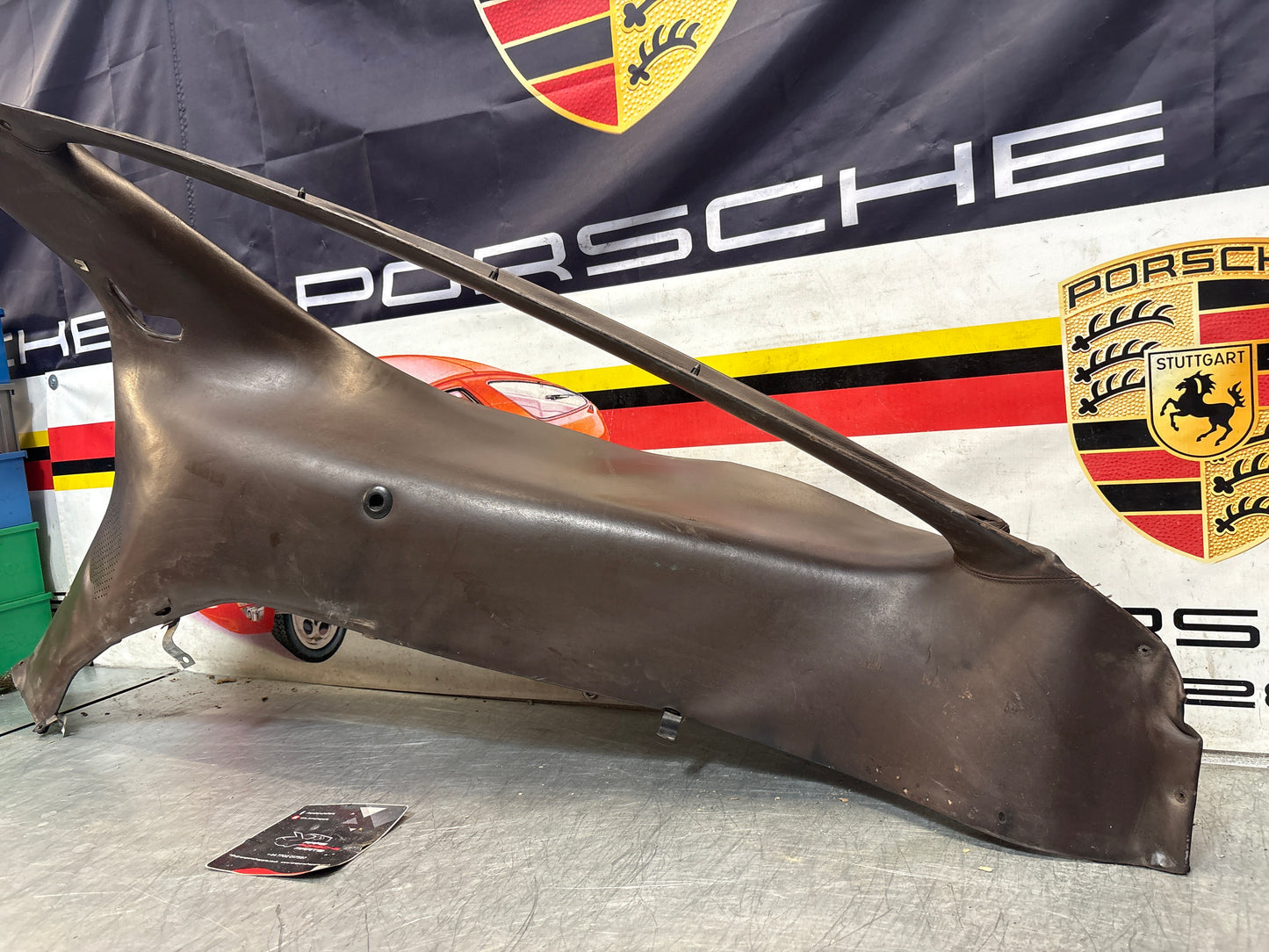 Porsche 928 early right side lower side trim panel, without loudspeaker, brown used 92855502202