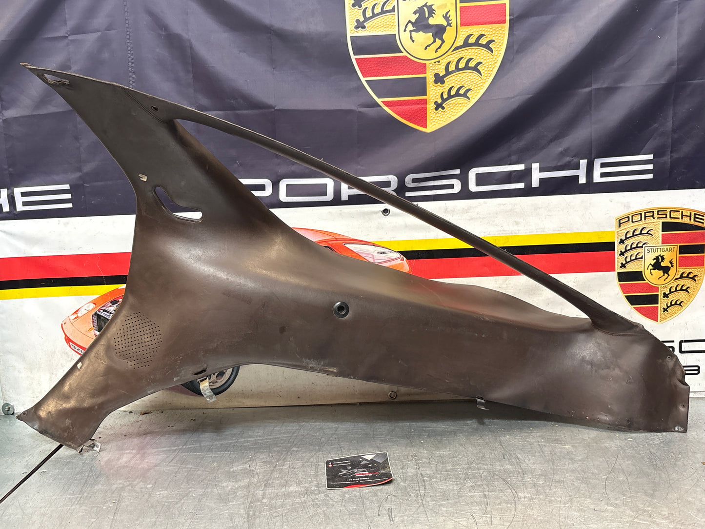 Porsche 928 early right side lower side trim panel, without loudspeaker, brown used 92855502202