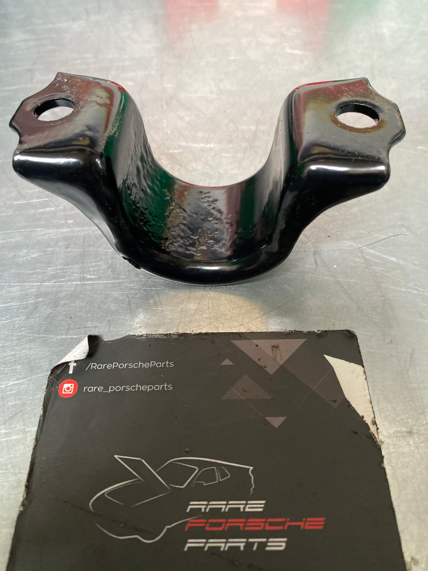 Porsche 928 front anti roll bar clamp, 92834377700 used