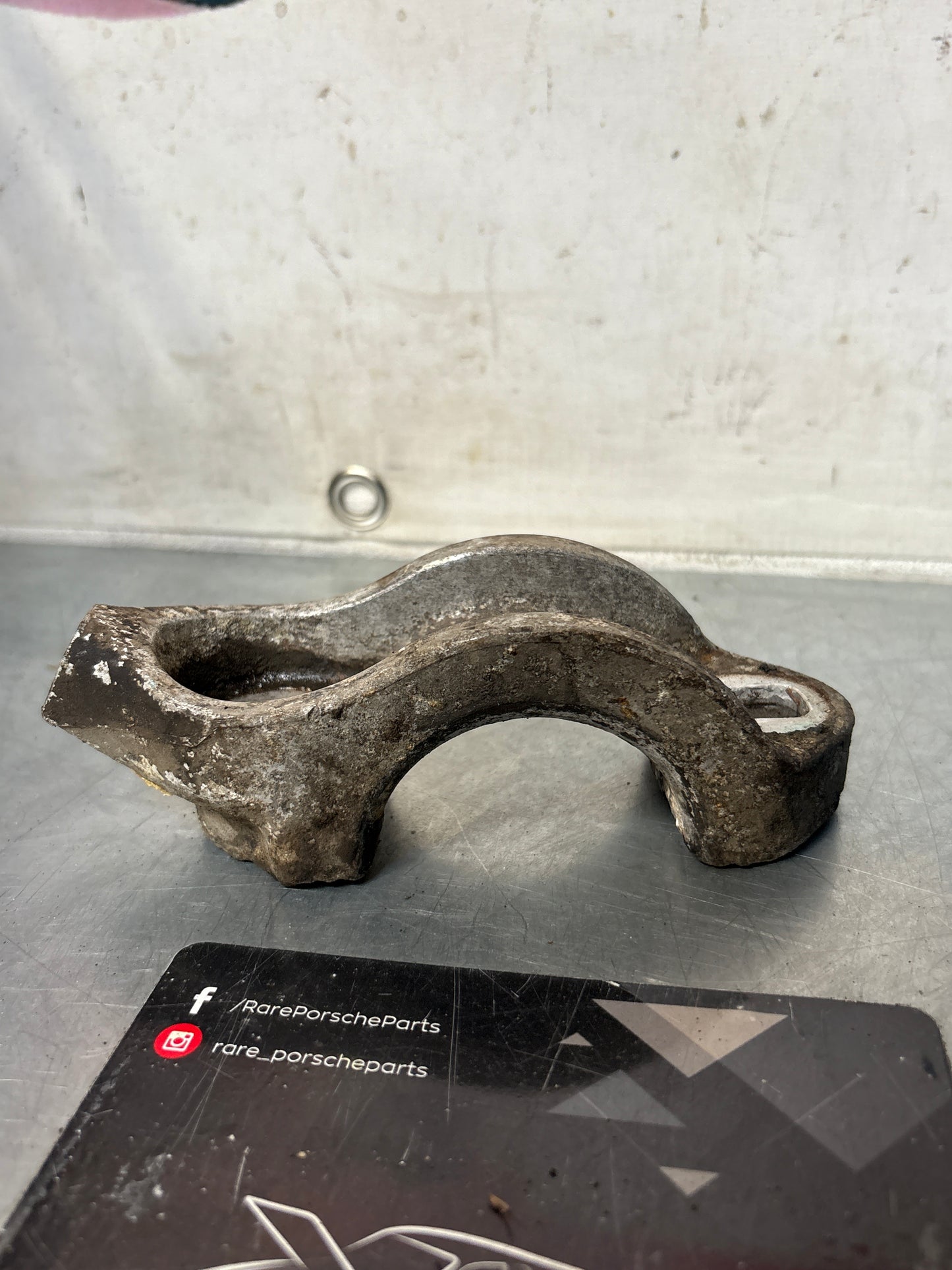 Porsche 928 rear left shock absorber bracket, used 92834116701