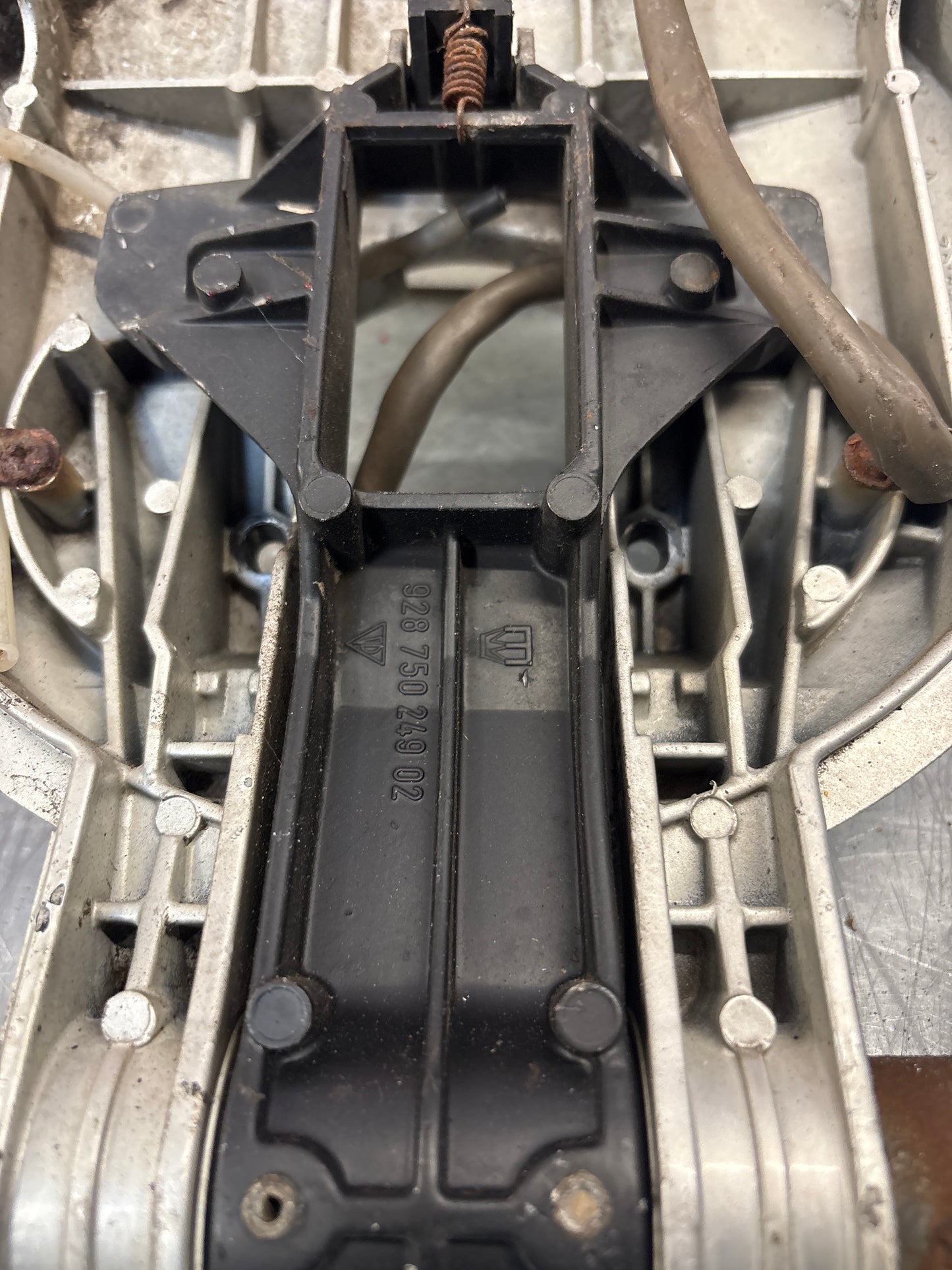 Porsche 928 right headlight swivel frame 92875024902 92875024302 used