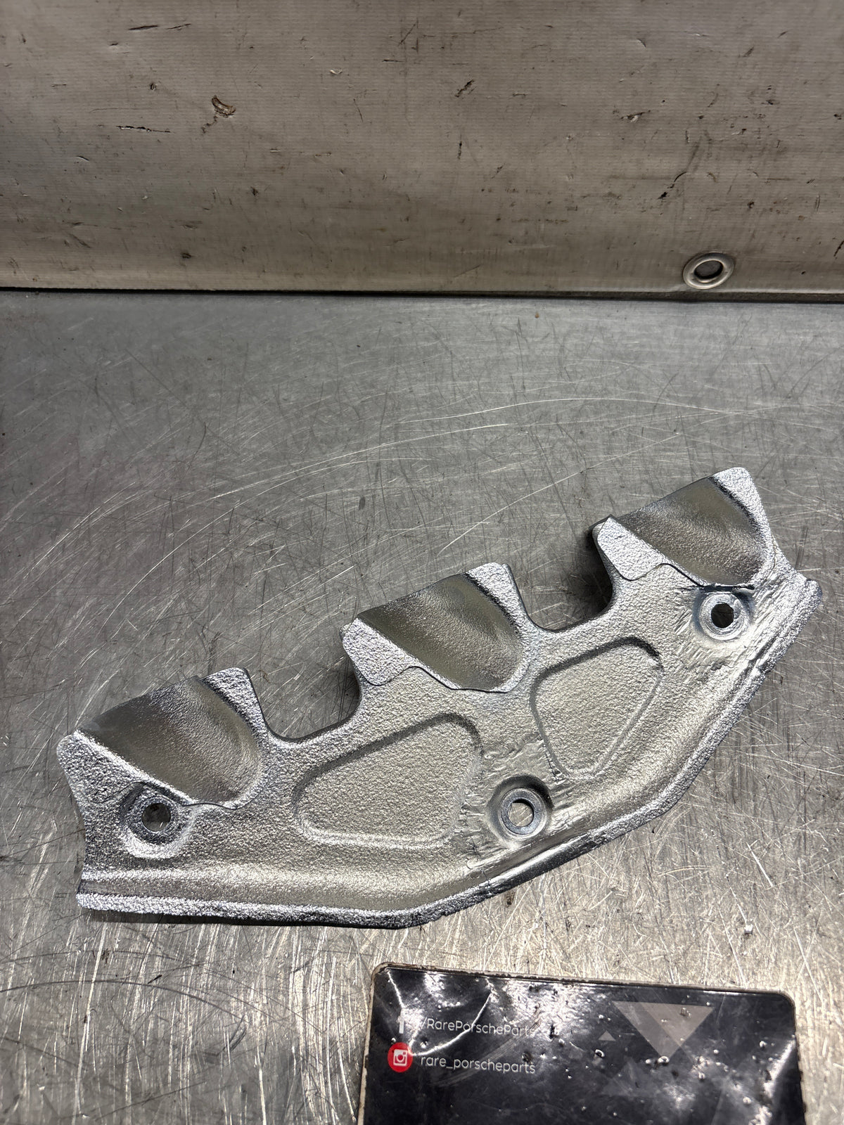 Porsche 924 exhaust heat shield / spark plug shield, refurbished 047129593